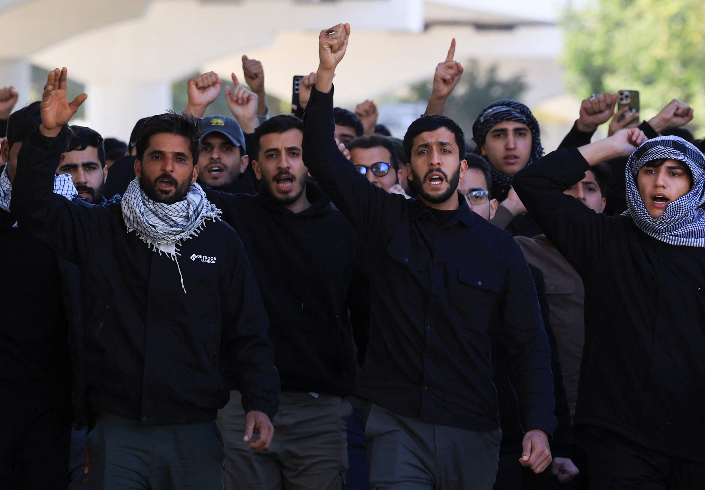 Supporters of Iraqi Shi'ite armed groups gather after the killing of Iran's Supreme Leader Ayatollah Ali Khamenei, in Baghdad