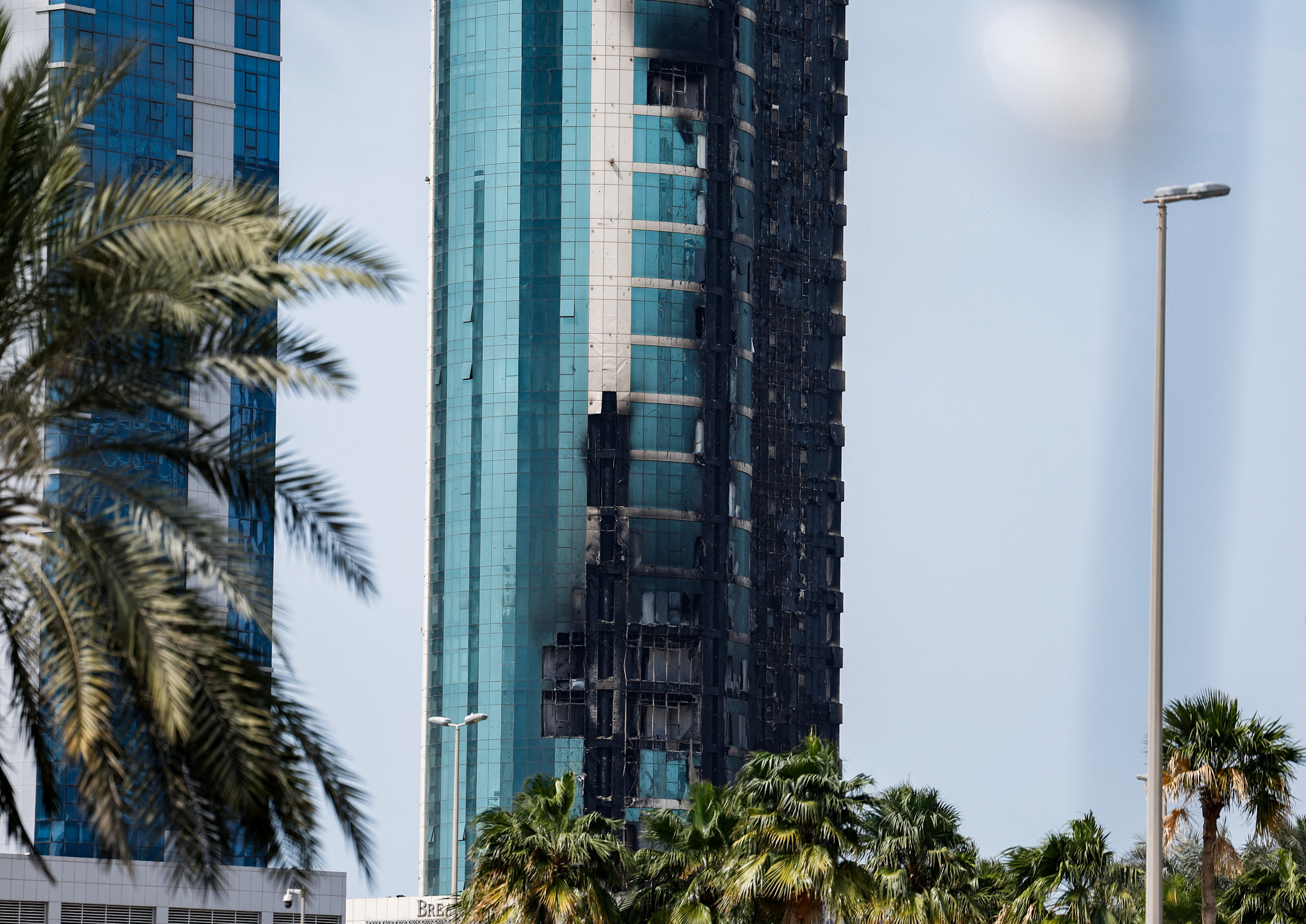 A building that was damaged by an Iranian drone attack, after Israel and the U.S. launched strikes on Iran, in Seef, Manama, Bahrain, March 1, 2026. REUTERS/Hamad I Mohammed