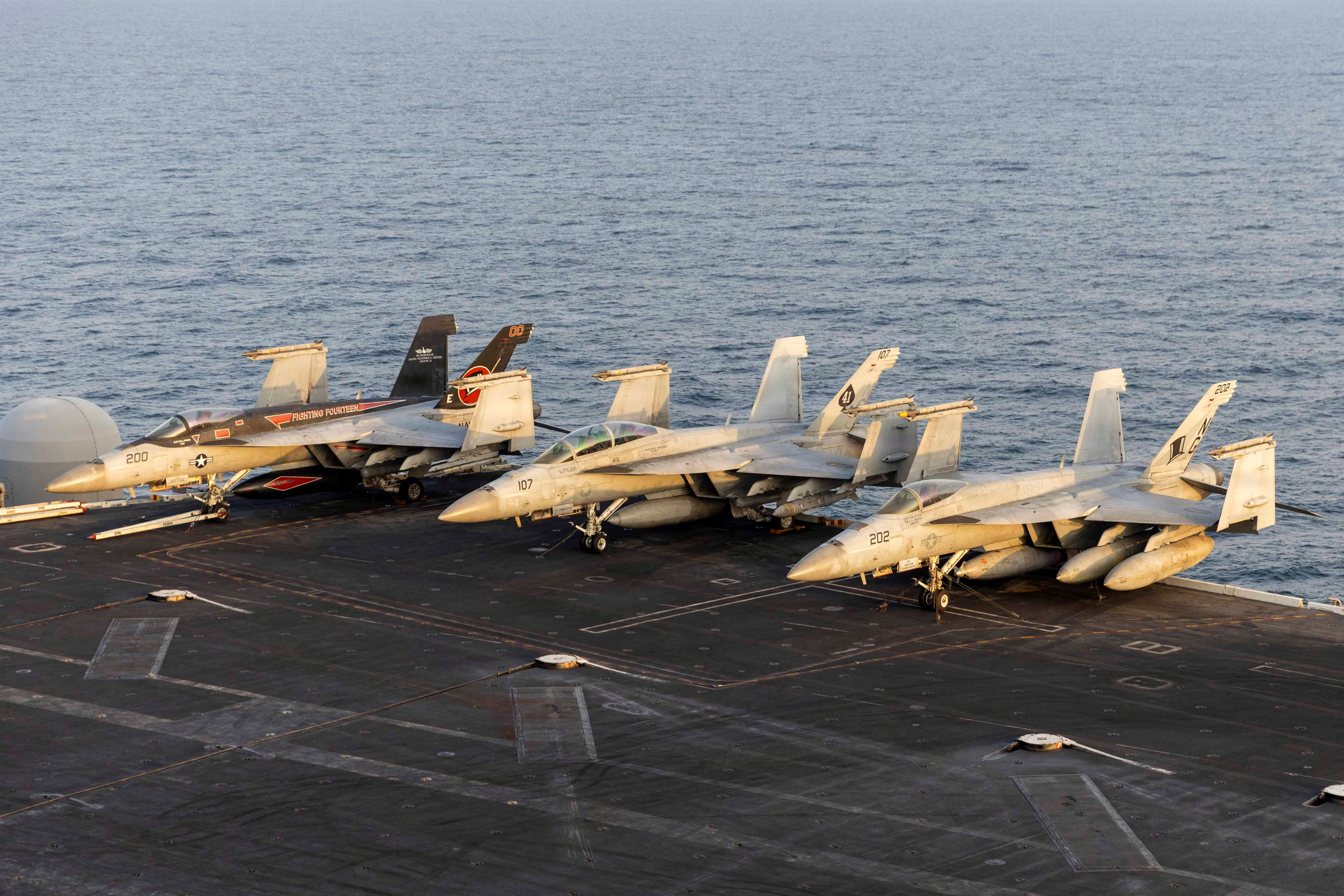 U.S. Navy aircraft attached to Carrier Air Wing 9 are staged on the flight deck of the Nimitz-class aircraft carrier USS Abraham Lincoln in support of the Operation Epic Fury attack on Iran from an undisclosed location March 14, 2026. U.S. Navy/Handout via REUTERS. THIS IMAGE HAS BEEN SUPPLIED BY A THIRD PARTY