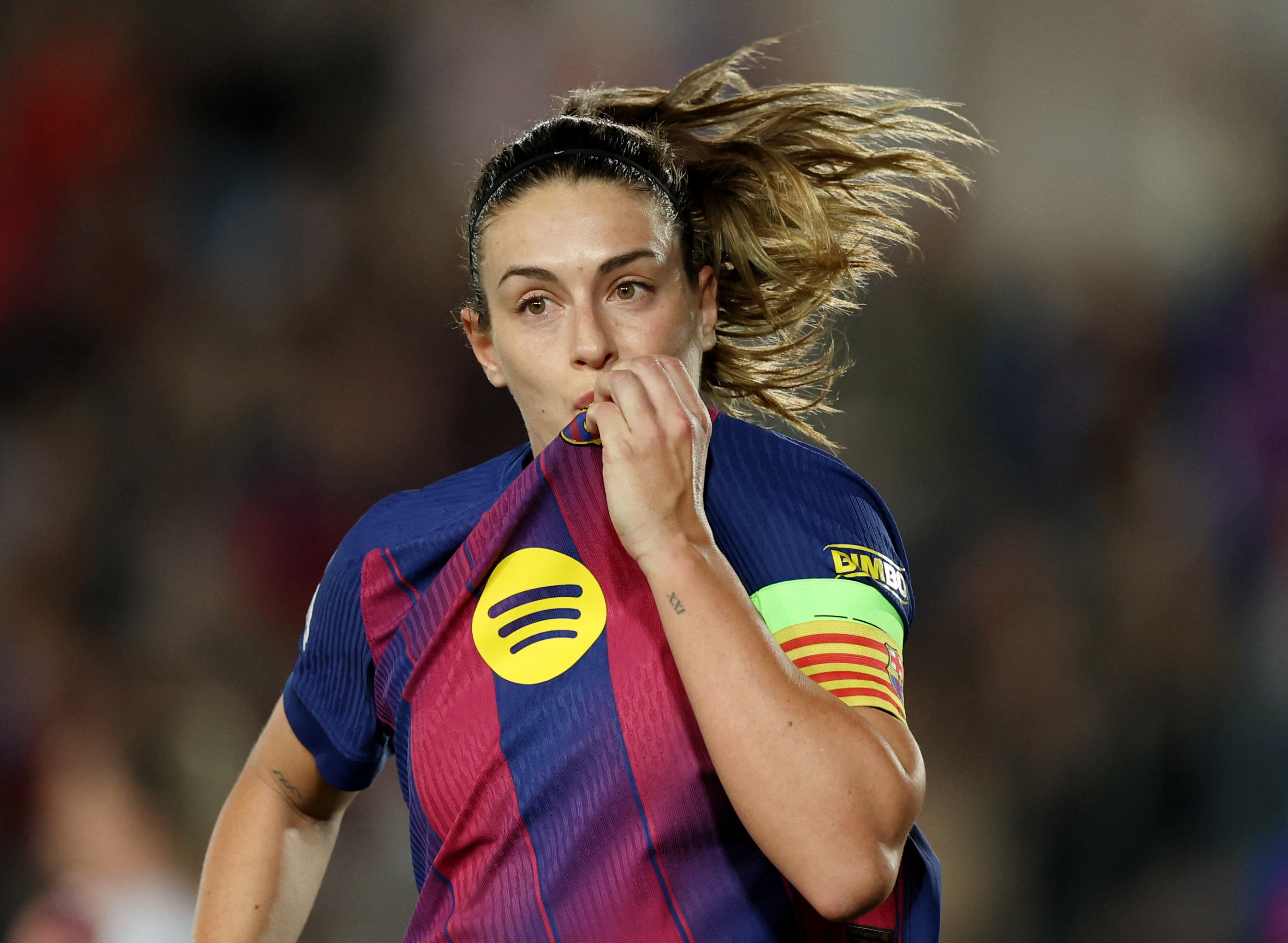 Barcelona's Alexia Putellas celebrates scoring their sixth goal