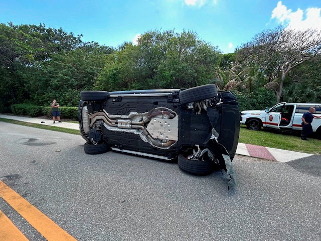 Tiger Woods' Land Rover rolled over on a two-lane road near his Jupiter Island home, in this handout image released by the Martin County Sheriff's Office