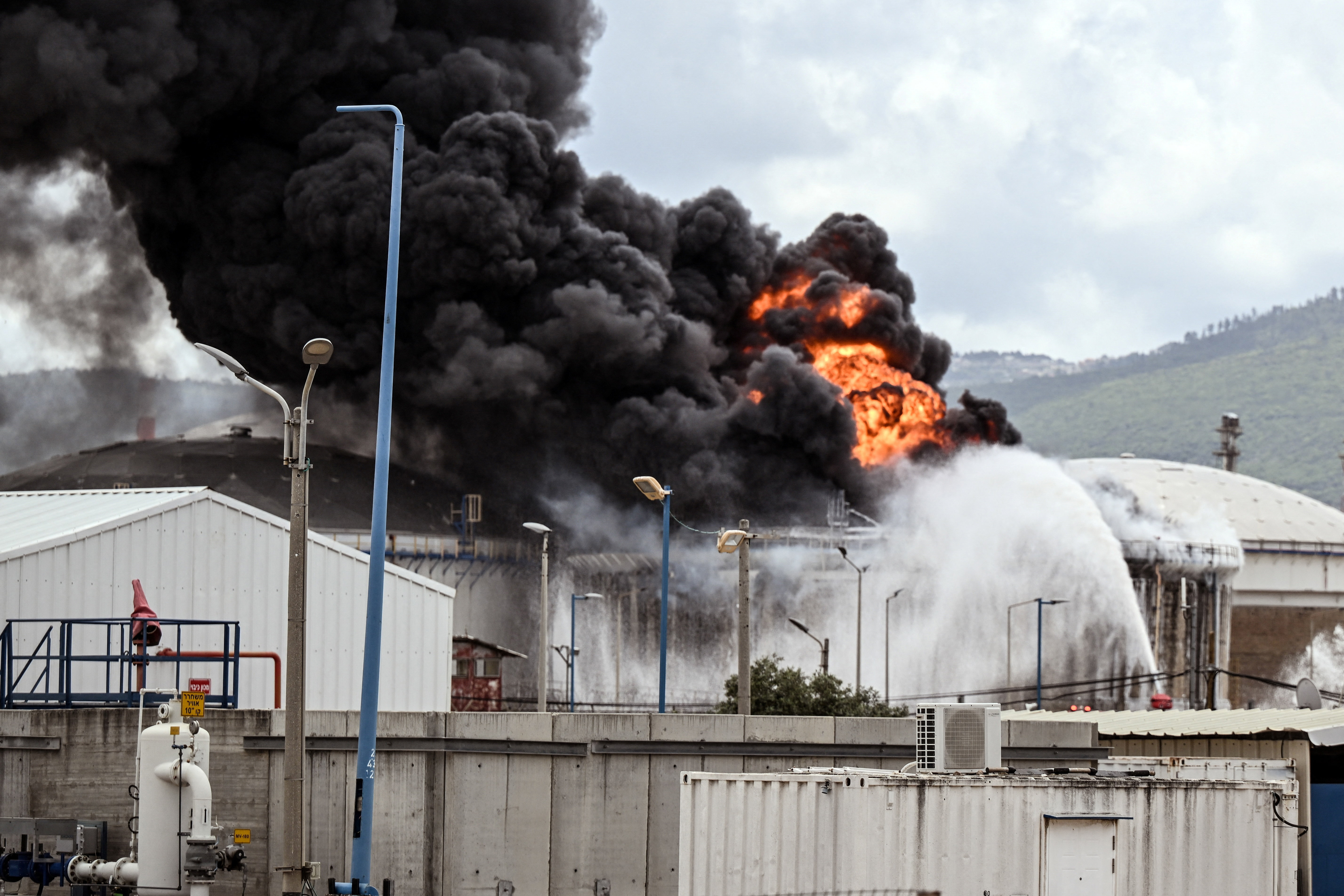 A blaze after Israel's Fire and Rescue Service said that an industrial building and a fuel tanker at Israel's Oil Refineries were hit by debris from an intercepted Iranian missile, amid the U.S.-Israel conflict with Iran, in Haifa, Israel March 30, 2026. REUTERS/Rami Shlush ISRAEL OUT NO COMMERCIAL OR EDITORIAL SALES IN ISRAEL