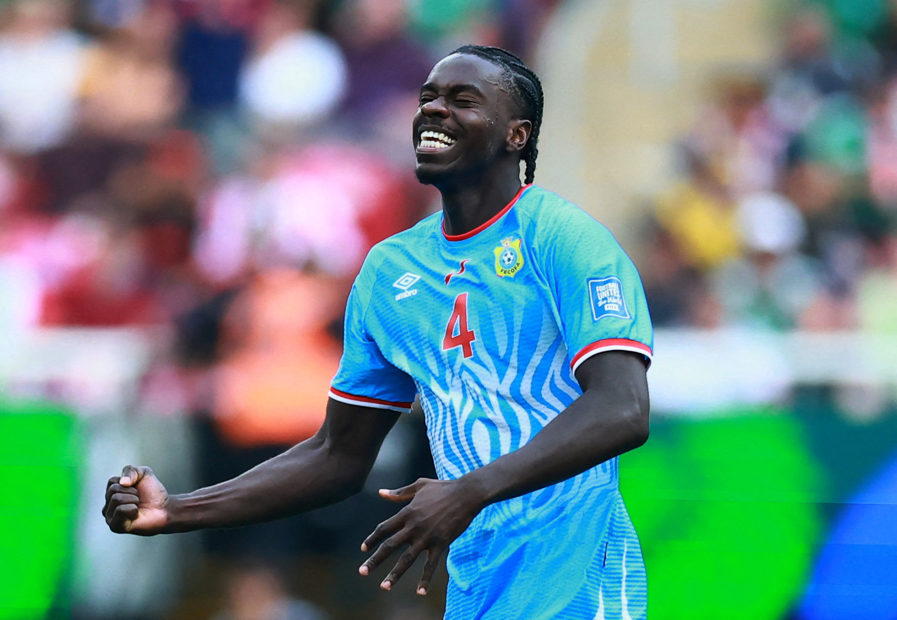 DR Congo's Axel Tuanzebe celebrates scoring their first goal in extra-time