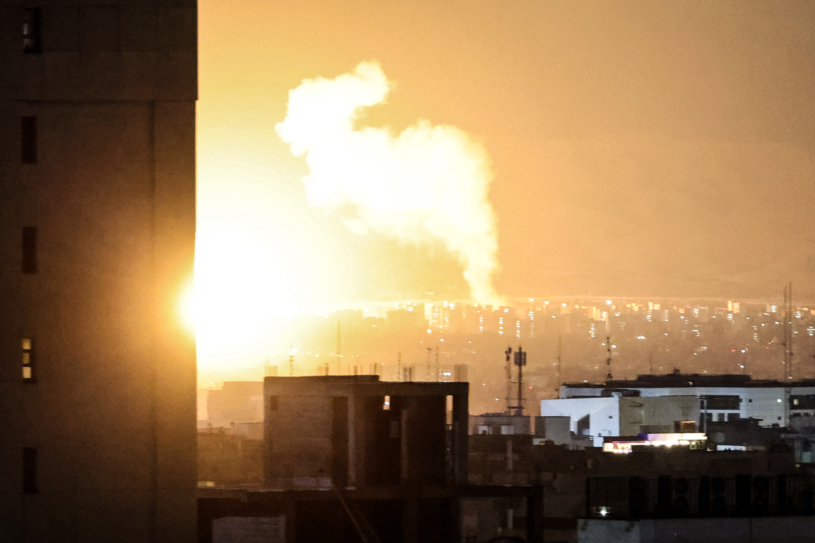 Smoke and fire rise from the site of airstrikes in a central area of the Iranian capital Tehran on March 6, 2026. Fresh strikes rocked Iran and Lebanon on March 6, as Israel vowed to escalate to a new phase in the Middle East war that has spiralled rapidly throughout the region and beyond. (Photo by ATTA KENARE / AFP)