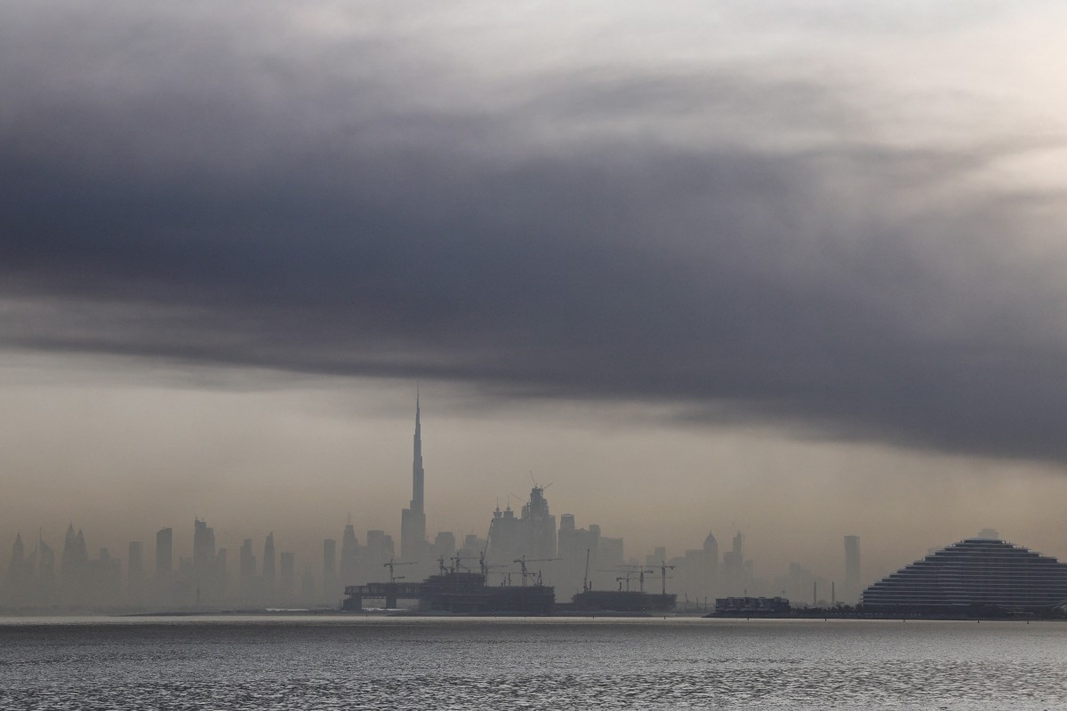 Smoke is seen above Dubai on March 13, 2026. Explosions rattled buildings in Dubai and a large cloud of smoke hung over a central area of the Middle East financial hub on March 13, AFP correspondents said [AFP]