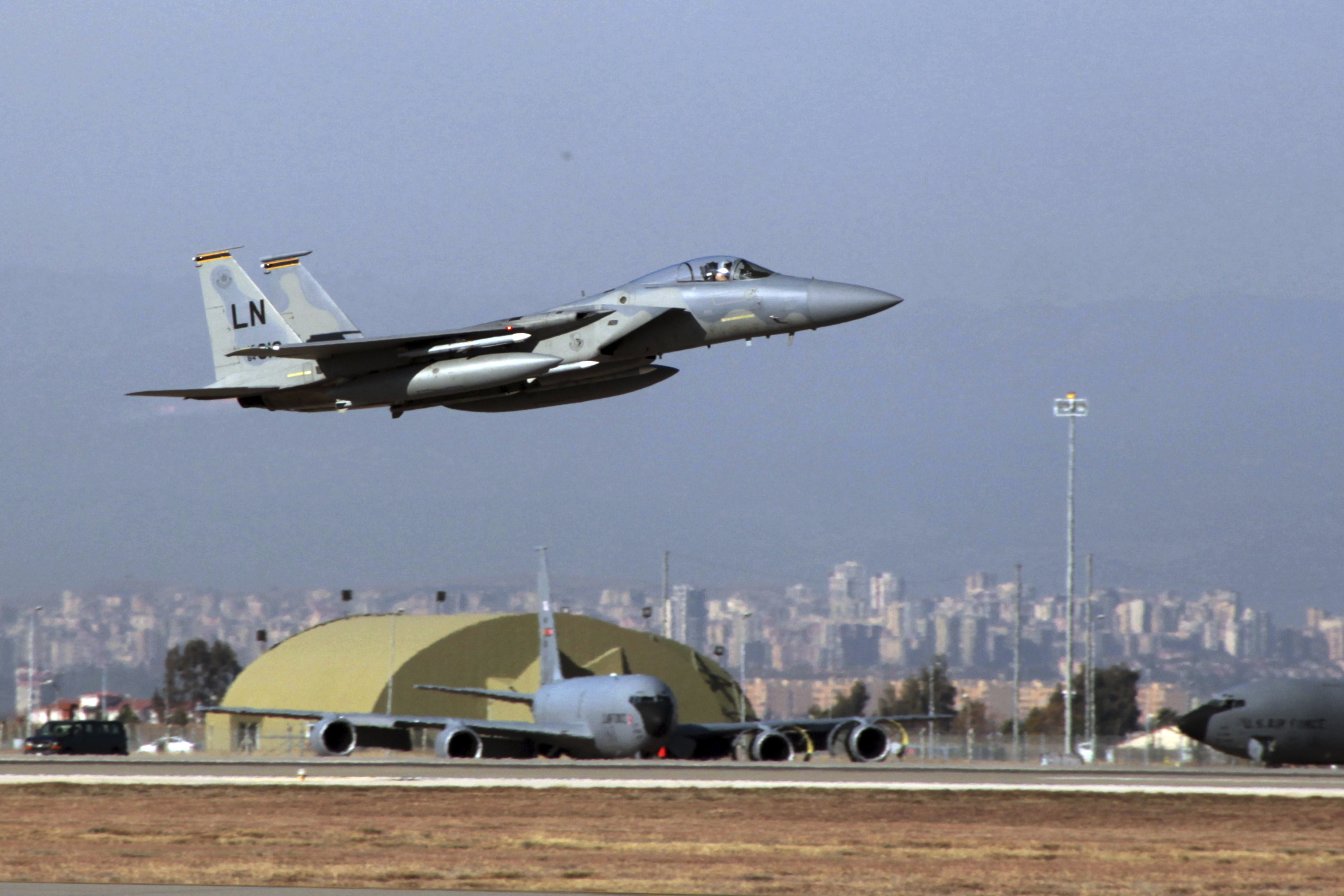 A US Air Force F-15 fighter jet takes off from an air base.