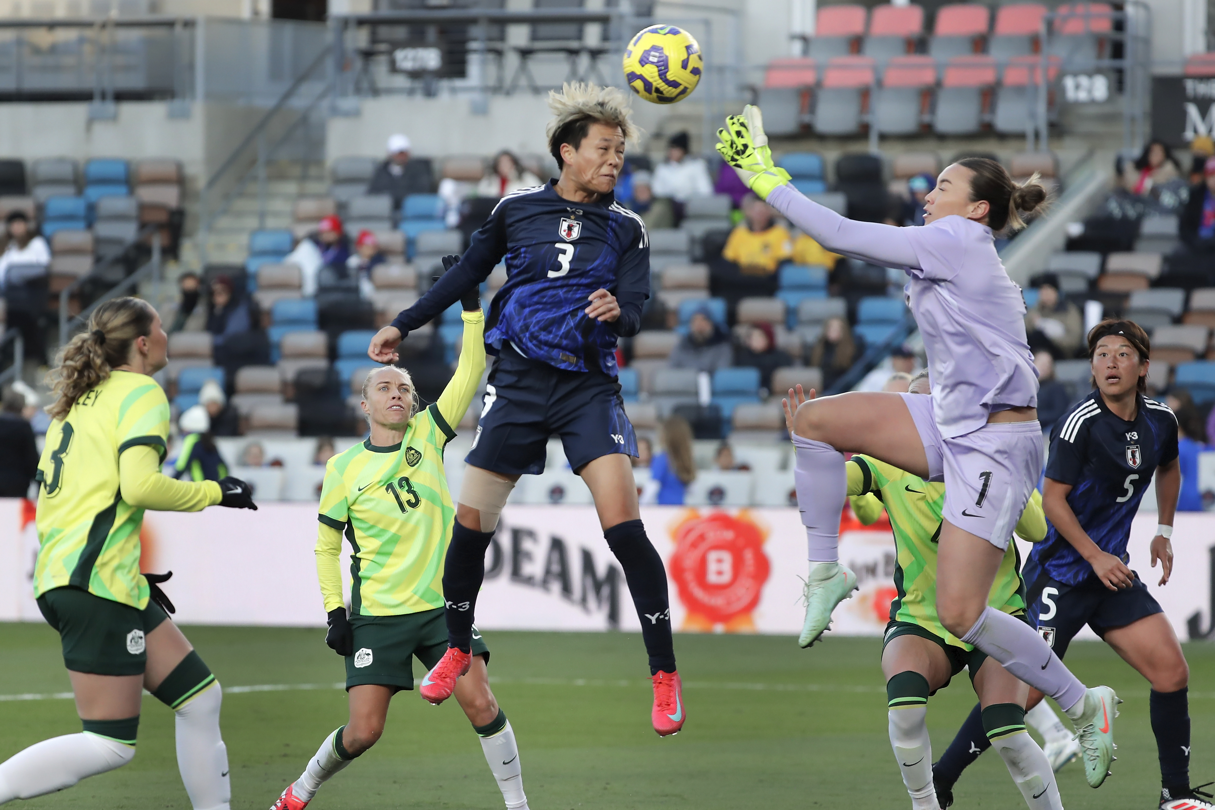 Japan defender Moeka Minami (3) headers in a goal past Australia goalkeeper Mackenzie Arnold (1) on a corner kick during the SheBelieves Cup women's soccer tournament, Thursday, Feb. 20, 2025, in Houston. (AP Photo/Michael Wyke)