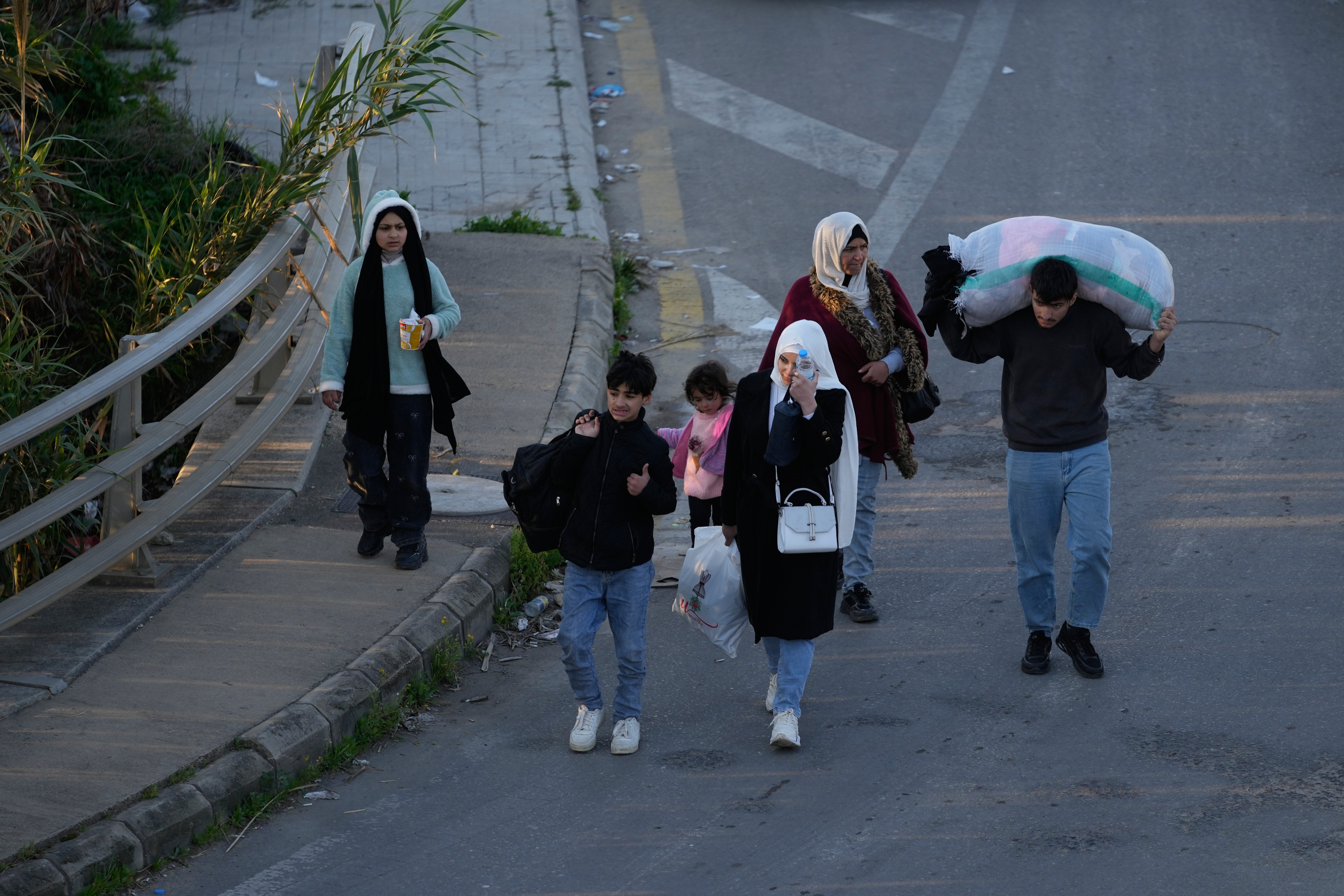 Lebanese civilians flee amid deadly Israeli strikes on Beirut suburbs