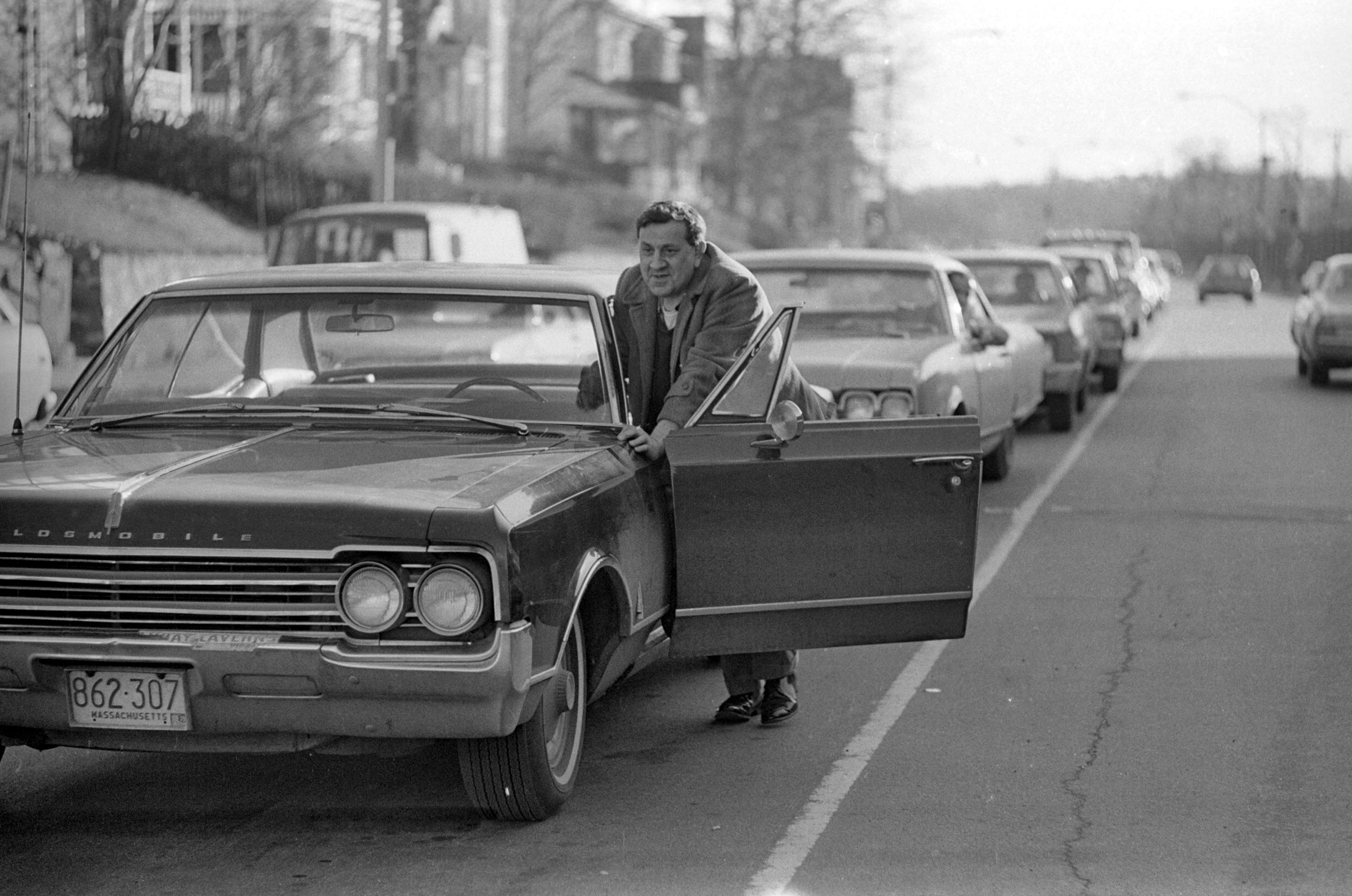 Drivers Push Cars To Gas Station During Oil Crisis Drivers push cars to a gas station during the oil crisis of 1973-74, Roslindale, Boston, Massachusetts, 1973. (Photo by Spencer Grant/Getty Images)