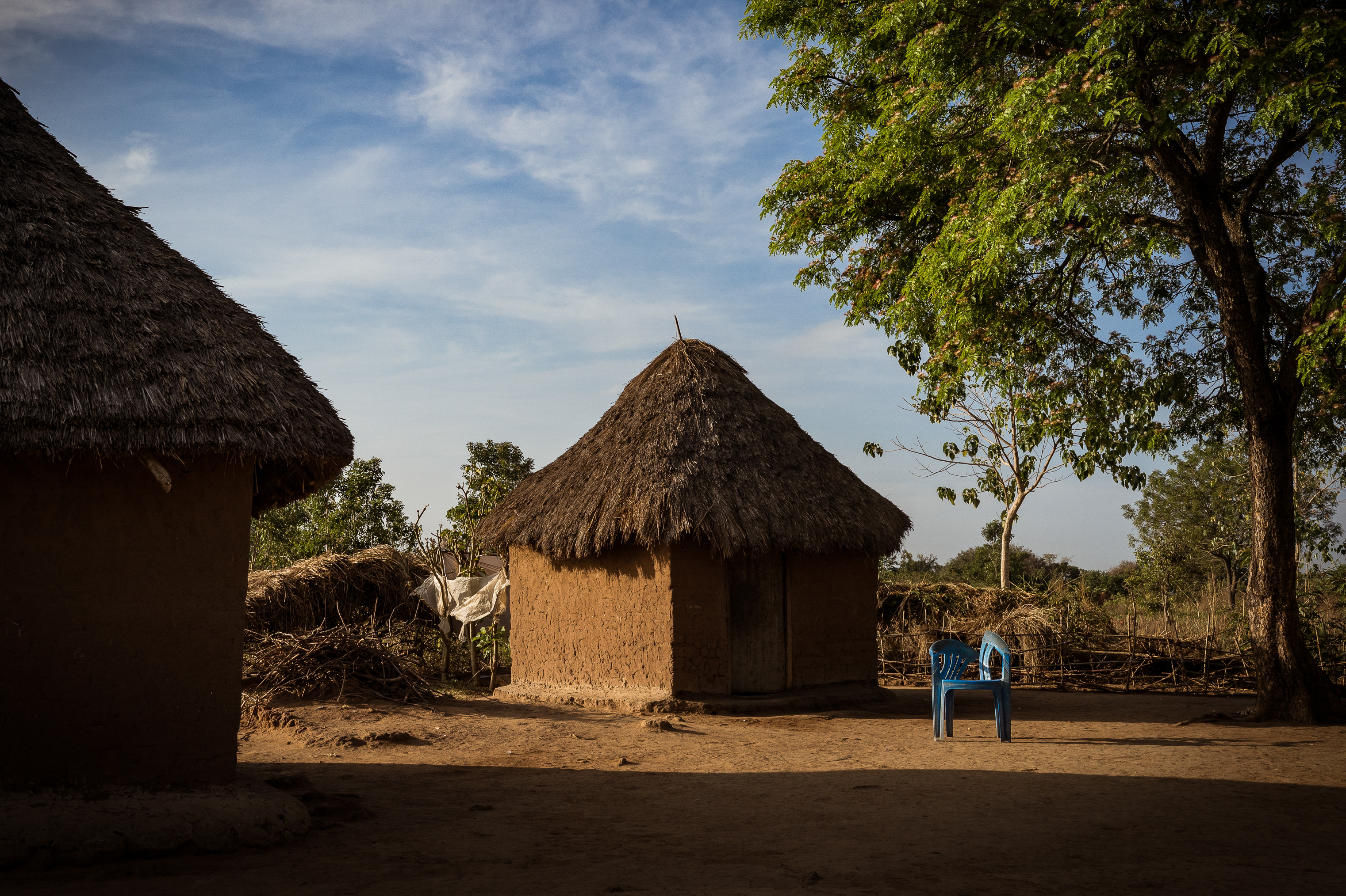 10th February 2026. Owalai, Uganda. The small home of Martha Apolot, 21 and her son Aaron Elayu, 8. The two metre by two metre mudbrick home is set at the rea of the families compound, isolated from the rest of the family. Aaron lives with an undiagnosed disability and is cared for solely by his young mother Martha after she fell pregnant in dubious circumstances at age 13. She has been shunned by her family and recieves little assistance from them outside her older brother who has also been shunned for helping her. Photograph by Christopher Hopkins
