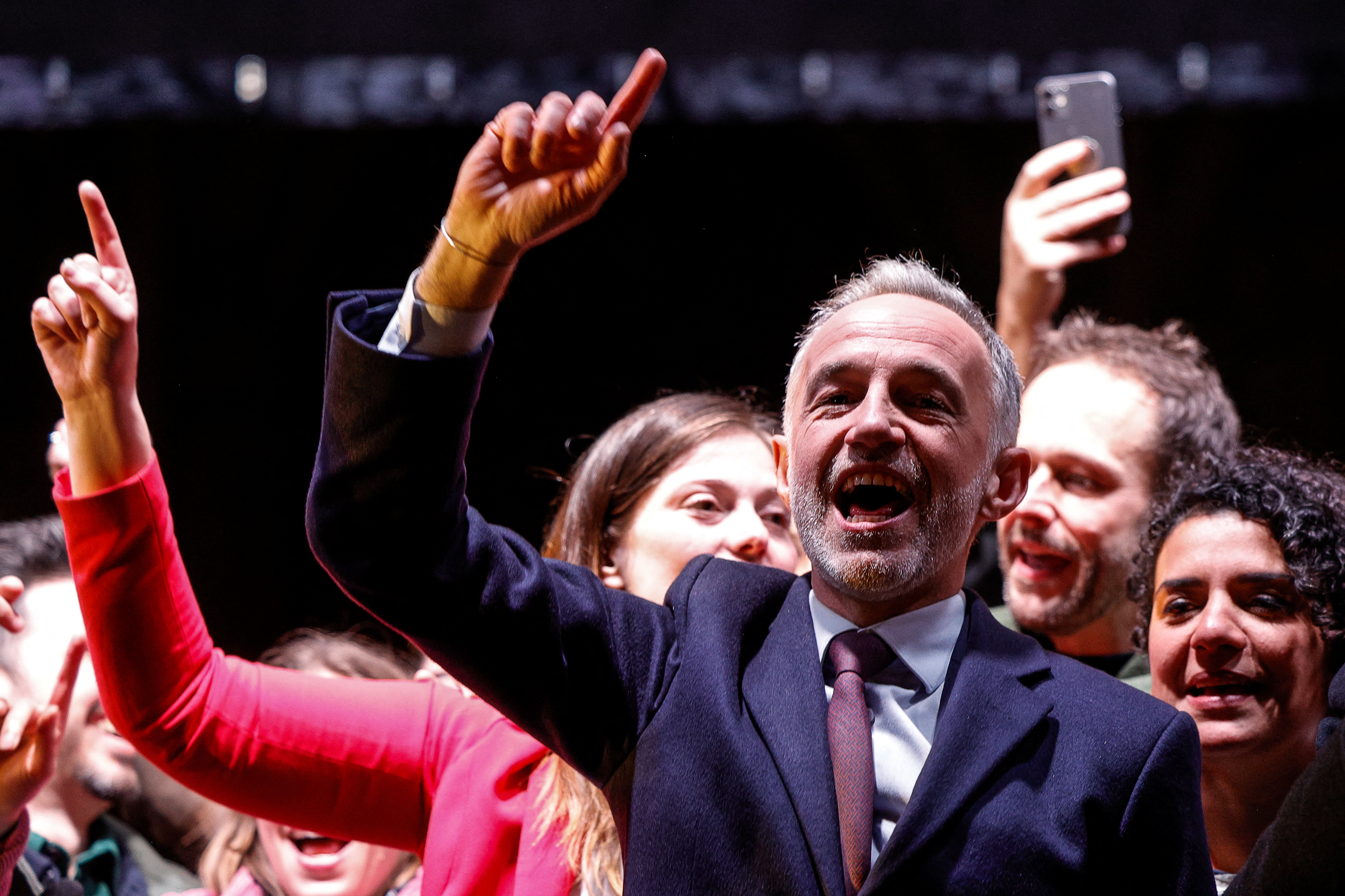 Socialist Party (PS) Member of Parliament and left wing Paris mayoral candidate Emmanuel Gregoire celebrates during a gathering following the second round of France's 2026 municipal elections in Paris on March 22, 2026.