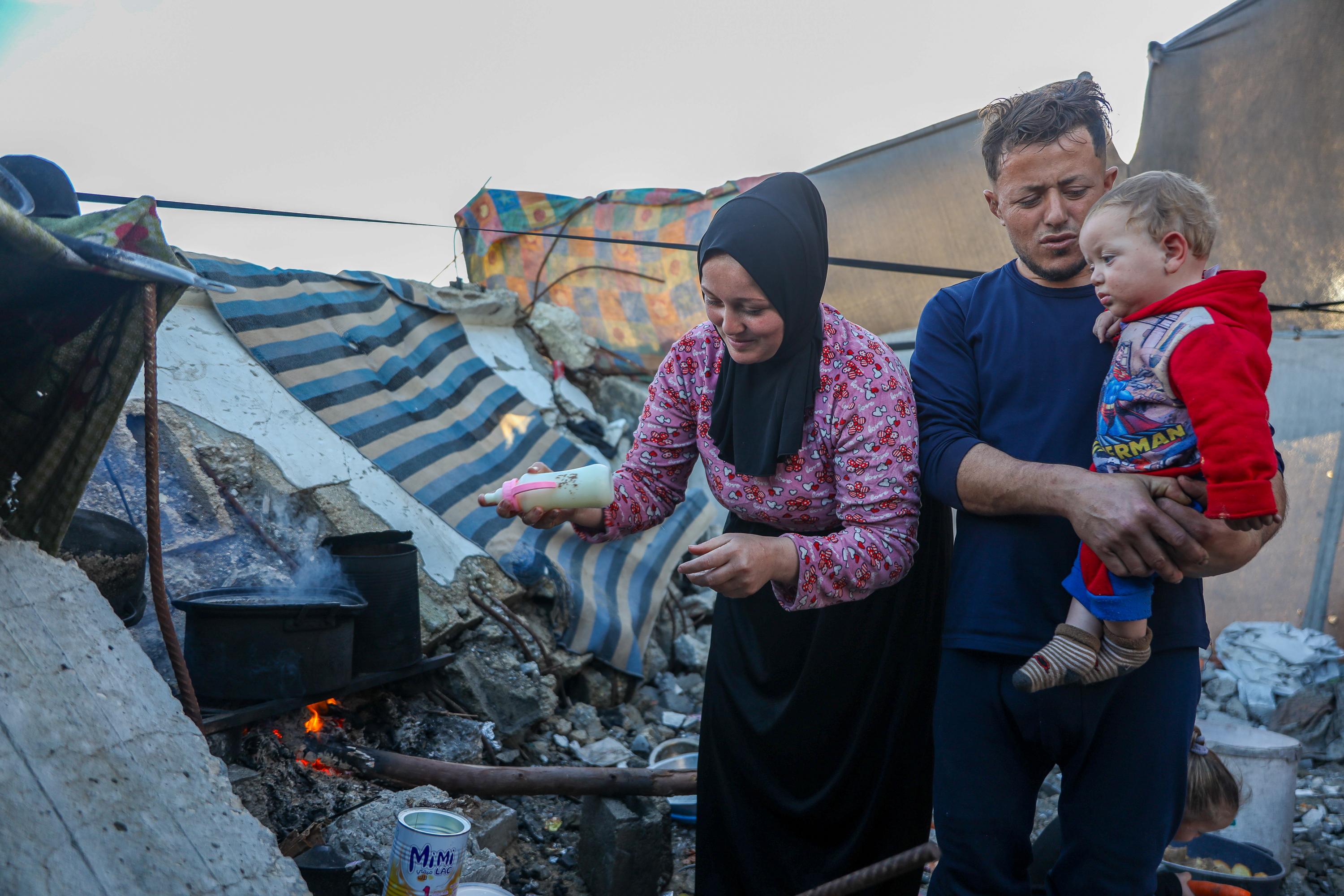 At times, Amani says she cannot boil water for her baby’s milk because lighting the fire is difficult and not always possible 