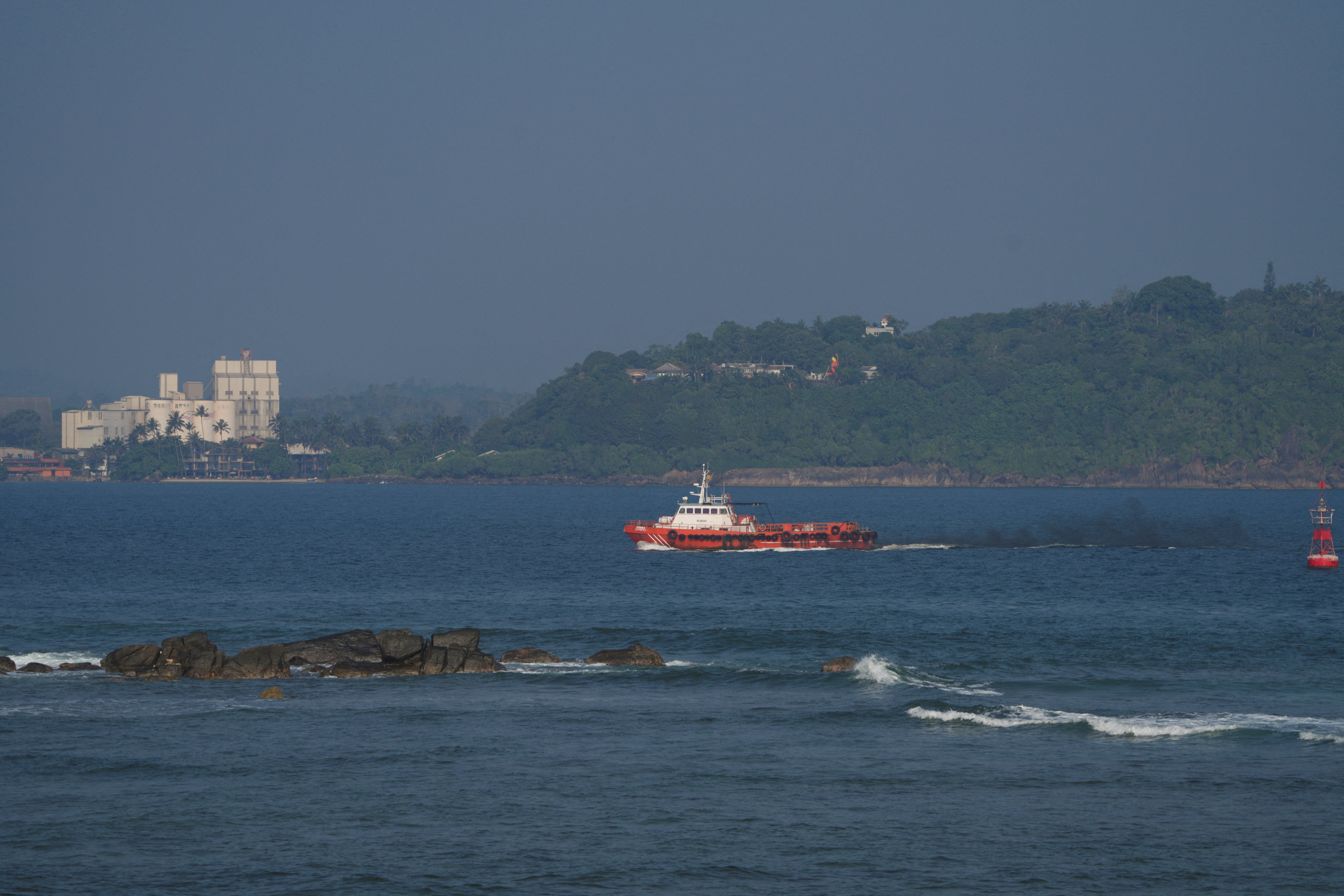 A vessel sails off the Galle coast after a submarine attack on the Iranian military ship, Iris Dena, off Sri Lanka, in Galle, Sri Lanka, March 4, 2026. REUTERS/Thilina Kaluthotage