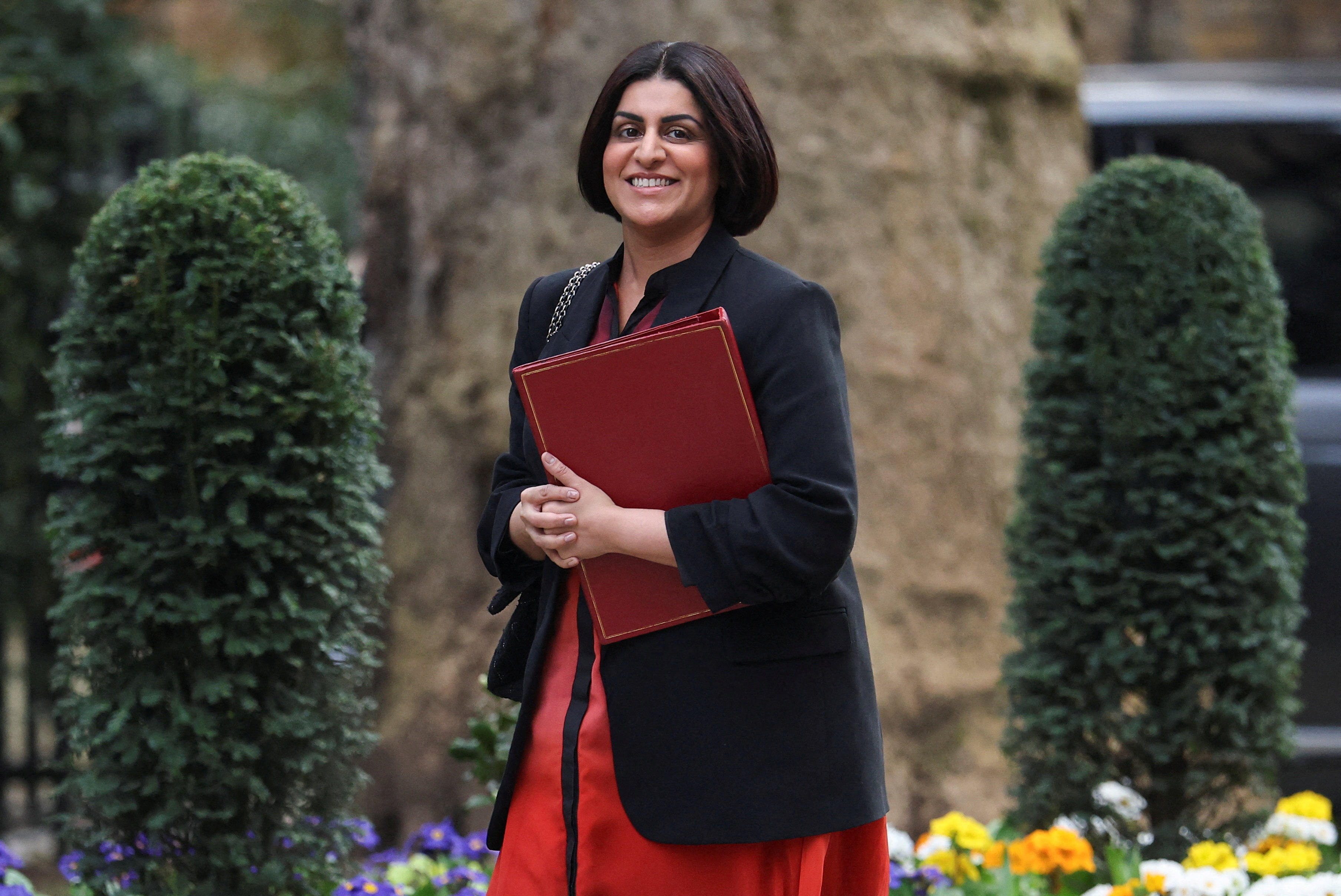 FILE PHOTO: British Home Secretary Shabana Mahmood walks outside of Downing Street, in London, Britain, March 3, 2026. REUTERS/Toby Melville/File Photo