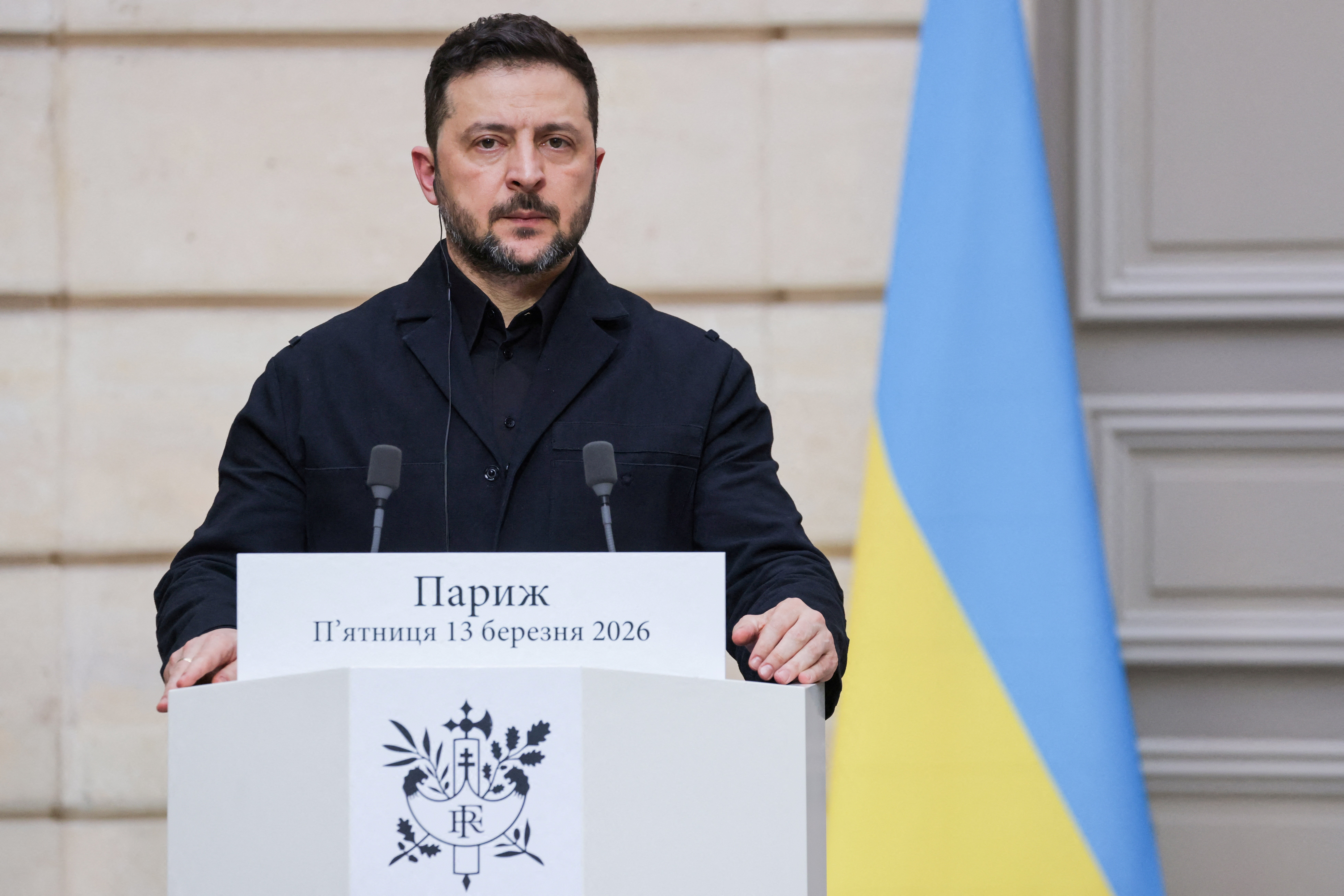 Ukraine's President Volodymyr Zelensky delivers a speech during a joint press conference with France's President Emmanuel Macron, at the Elysee Palace in Paris, March 13, 2026. LUDOVIC MARIN/Pool via REUTERS