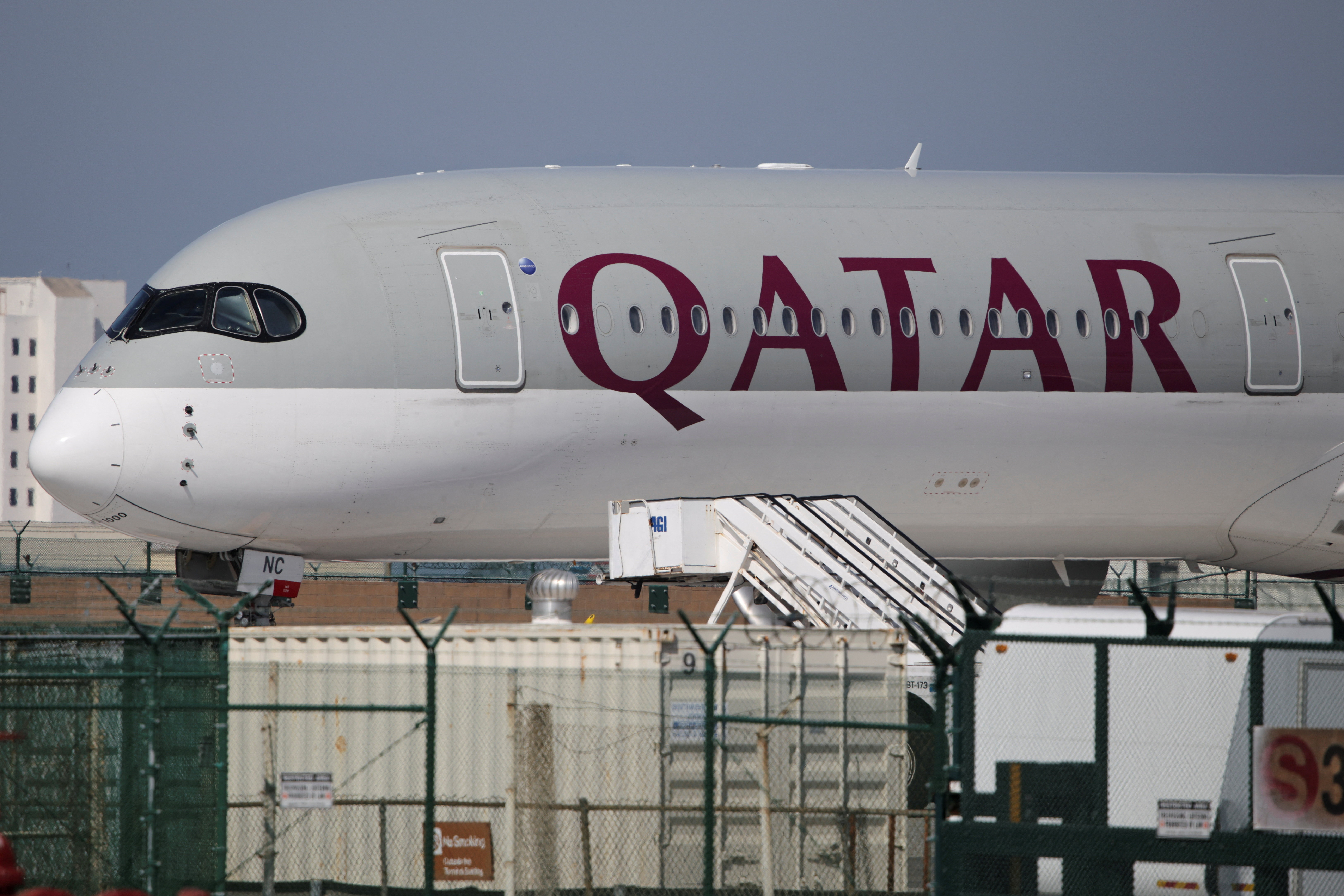 A Qatar Airways plane sits on the tarmac at Los Angeles International Airport (LAX) in Los Angeles, California, U.S. March 3, 2026. REUTERS/Daniel Cole