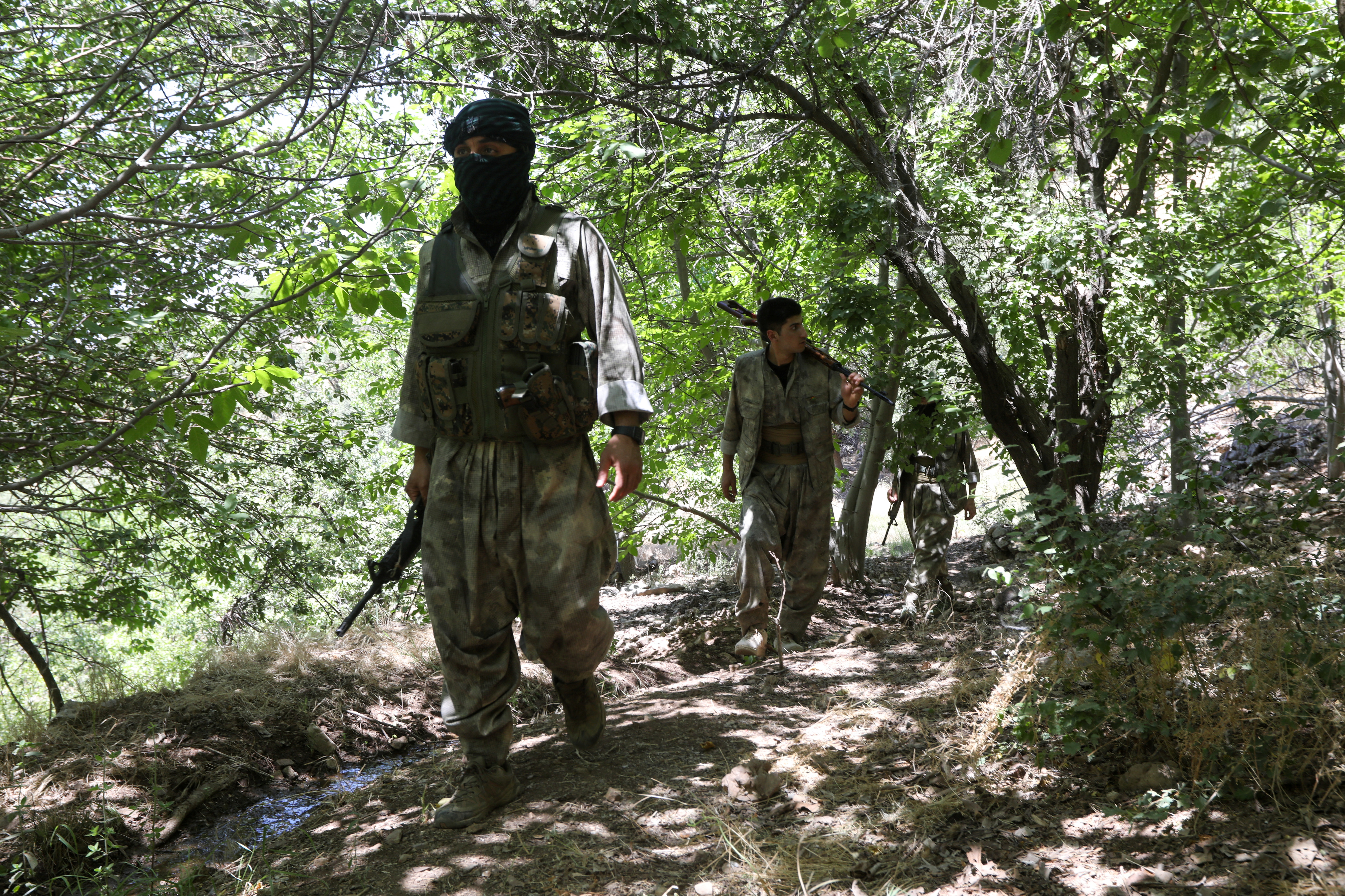 Fighters from the Kurdistan Free Life Party (PJAK), an Iranian Kurdish opposition group, are pictured near the border with Iran in Iraq's Kurdistan Region, in the outskirts of Sulaimaniya, Iraq, June 21, 2025. REUTERS/Ako Rasheed