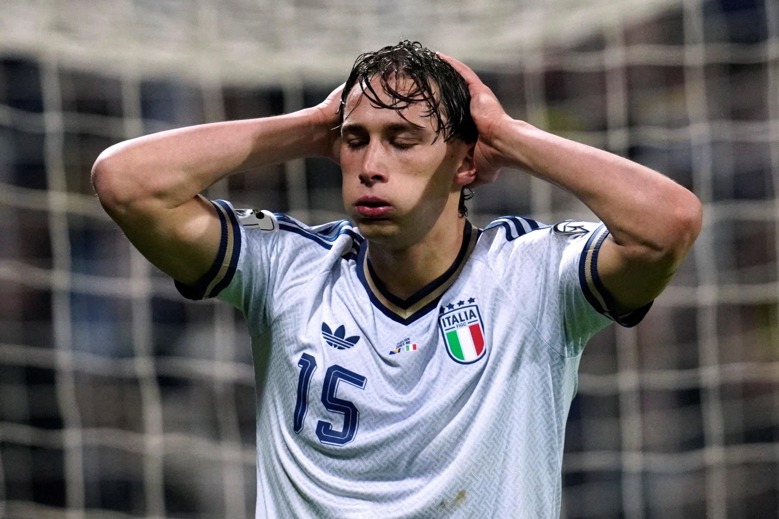 Italy's Pio Esposito reacts during extra time