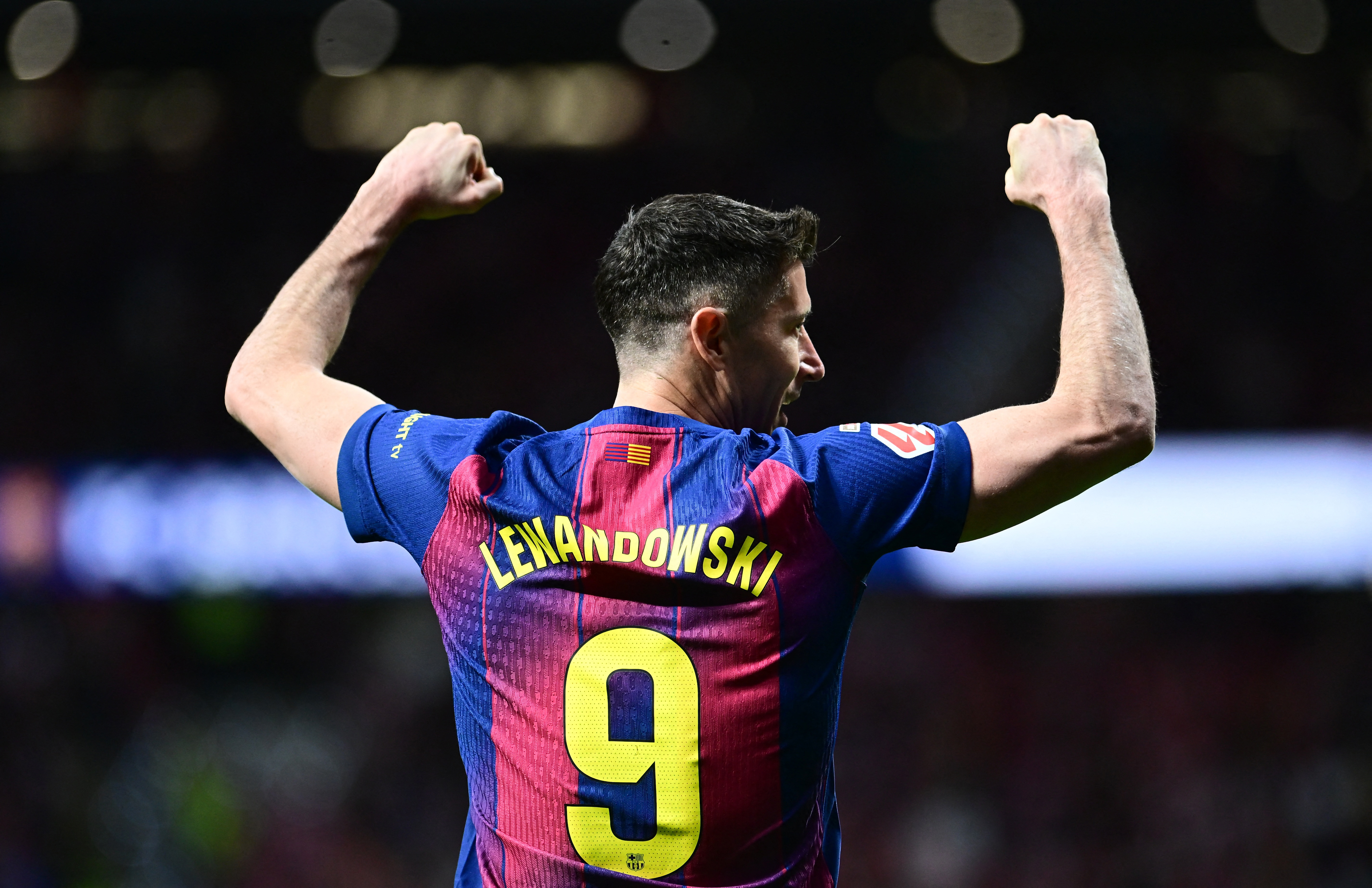 Barcelona's Robert Lewandowski celebrates after the match