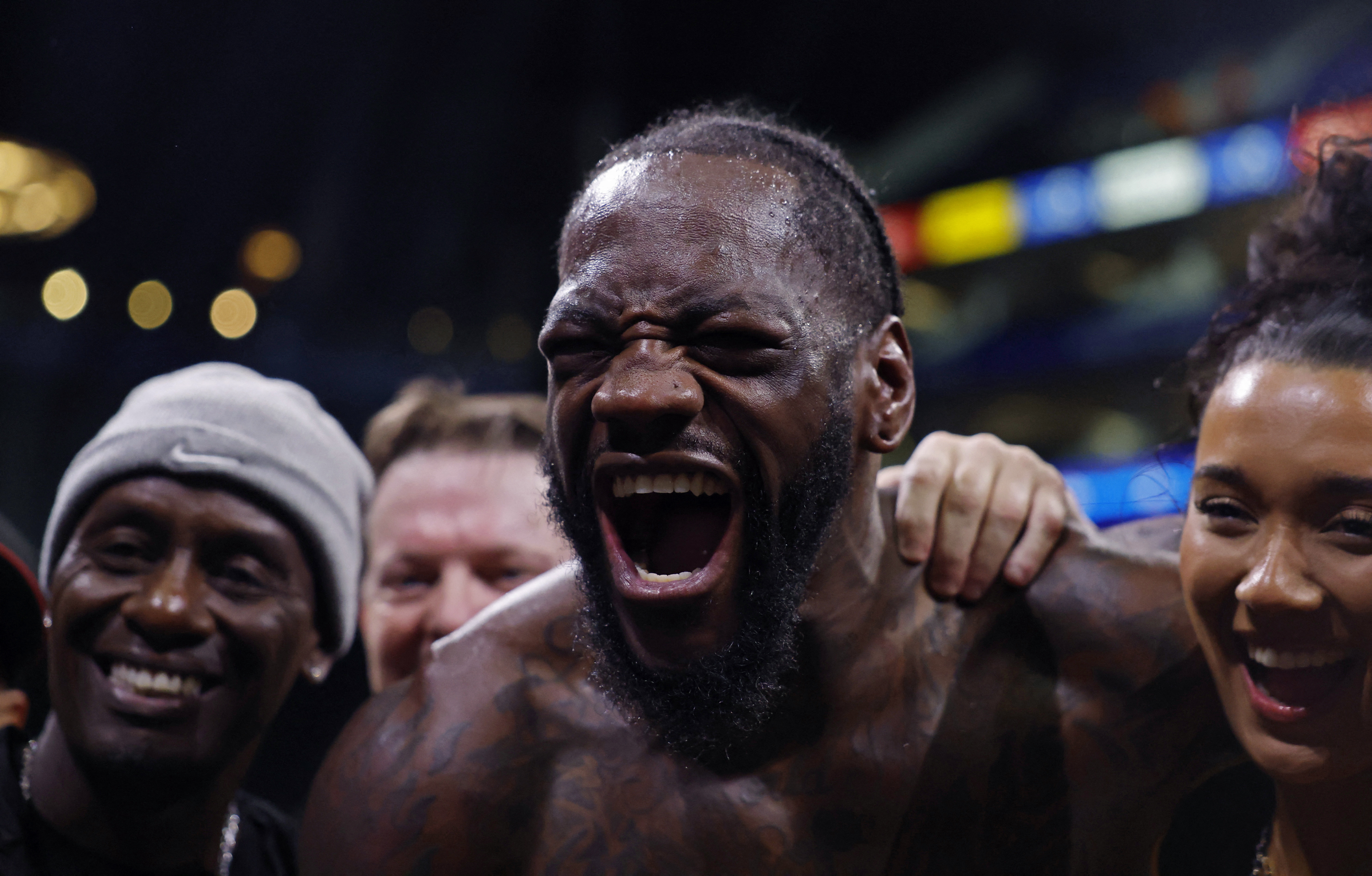 Deontay Wilder celebrates winning his fight against Derek Chisora