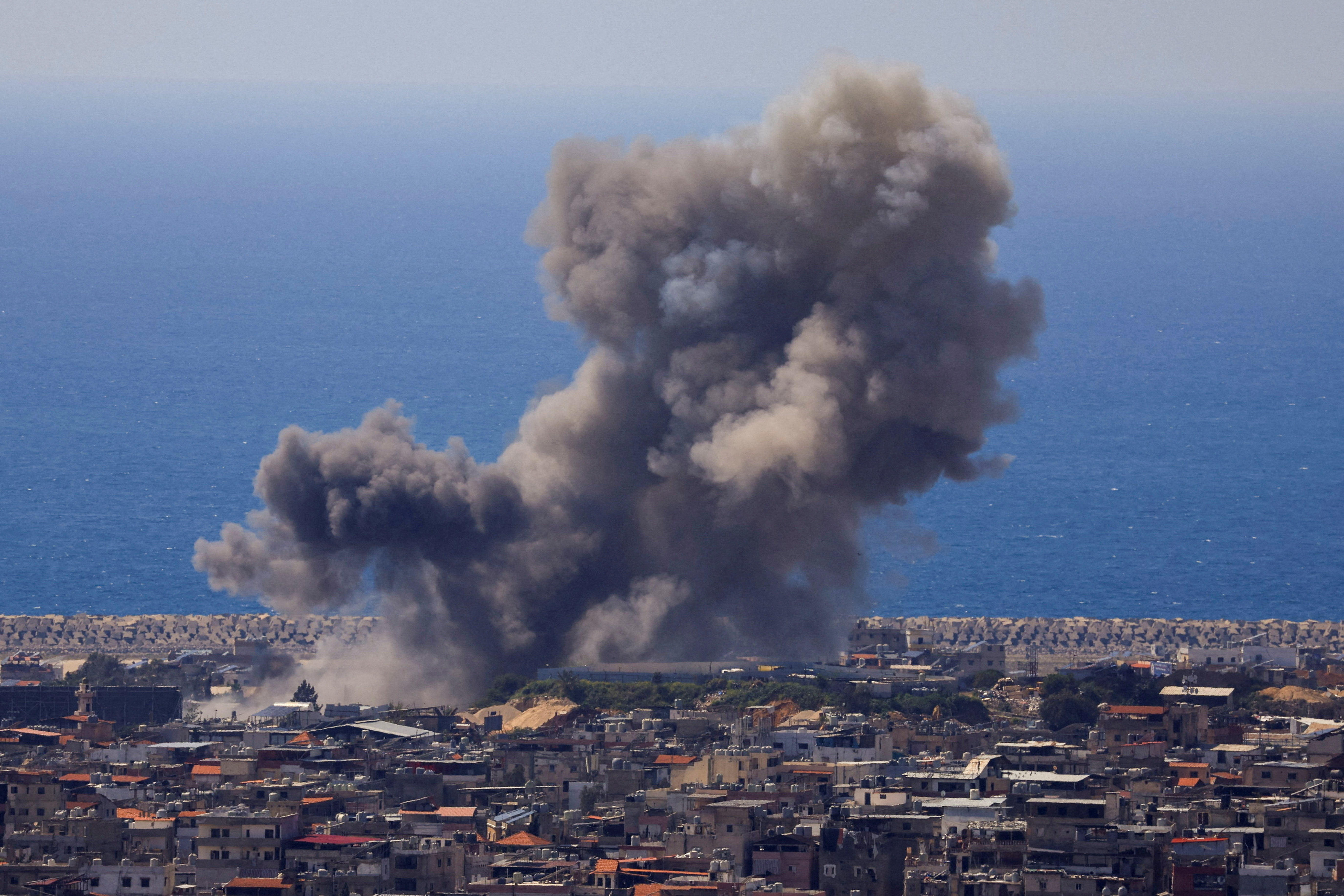 Smoke rises following an Israeli strike on the southern suburbs of Beirut, as seen from Baabda, Lebanon, April 8, 2026. [Mohamed Azakir/Reuters]