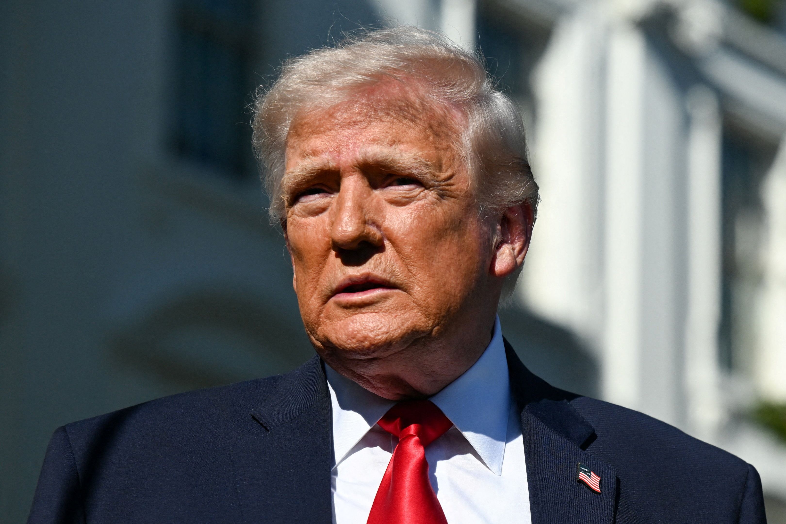 U.S. President Donald Trump looks on, as he departs from the White House, en route to Joint Base Andrews (JBA), in Washington, D.C., U.S., April 11, 2026. REUTERS/Annabelle Gordon