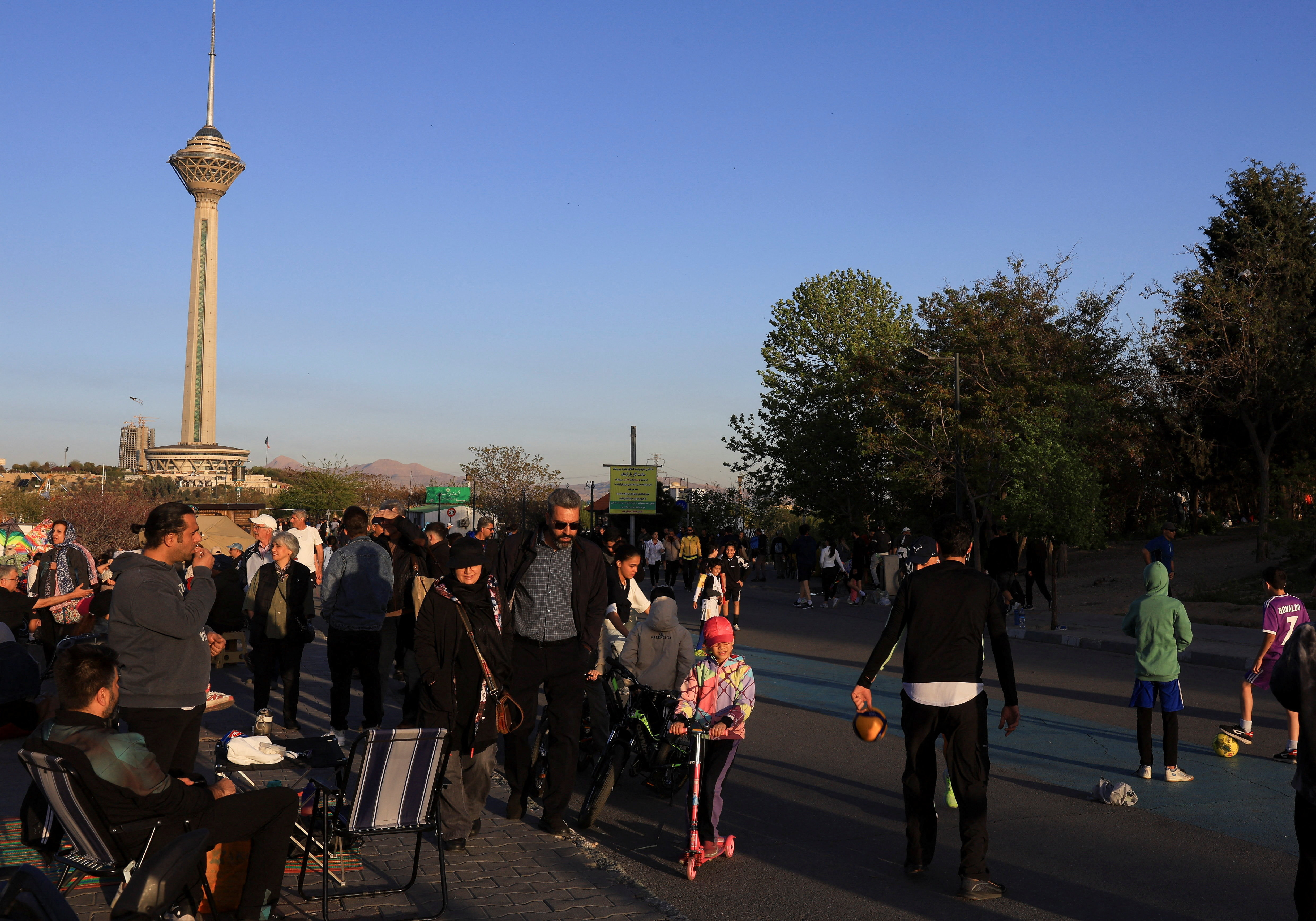 Iranians enjoy a sunny day in a public park, amid a two-week ceasefire in the U.S.-Israeli conflict with Iran, in Tehran