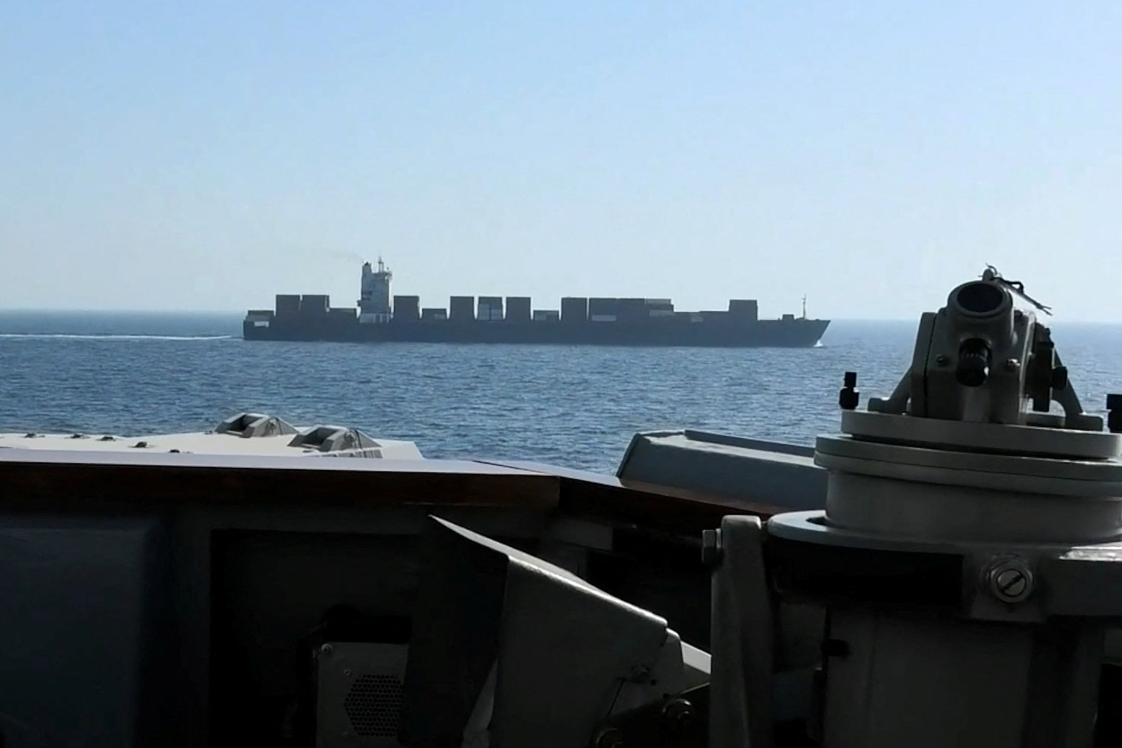 A view of Iranian-flagged cargo ship M/V Touska as the U.S. Navy Arleigh Burke-class Aegis guided missile destroyer USS Spruance conducts its interception in a location given as the north Arabian Sea, in this screen capture from a video released April 19, 2026.