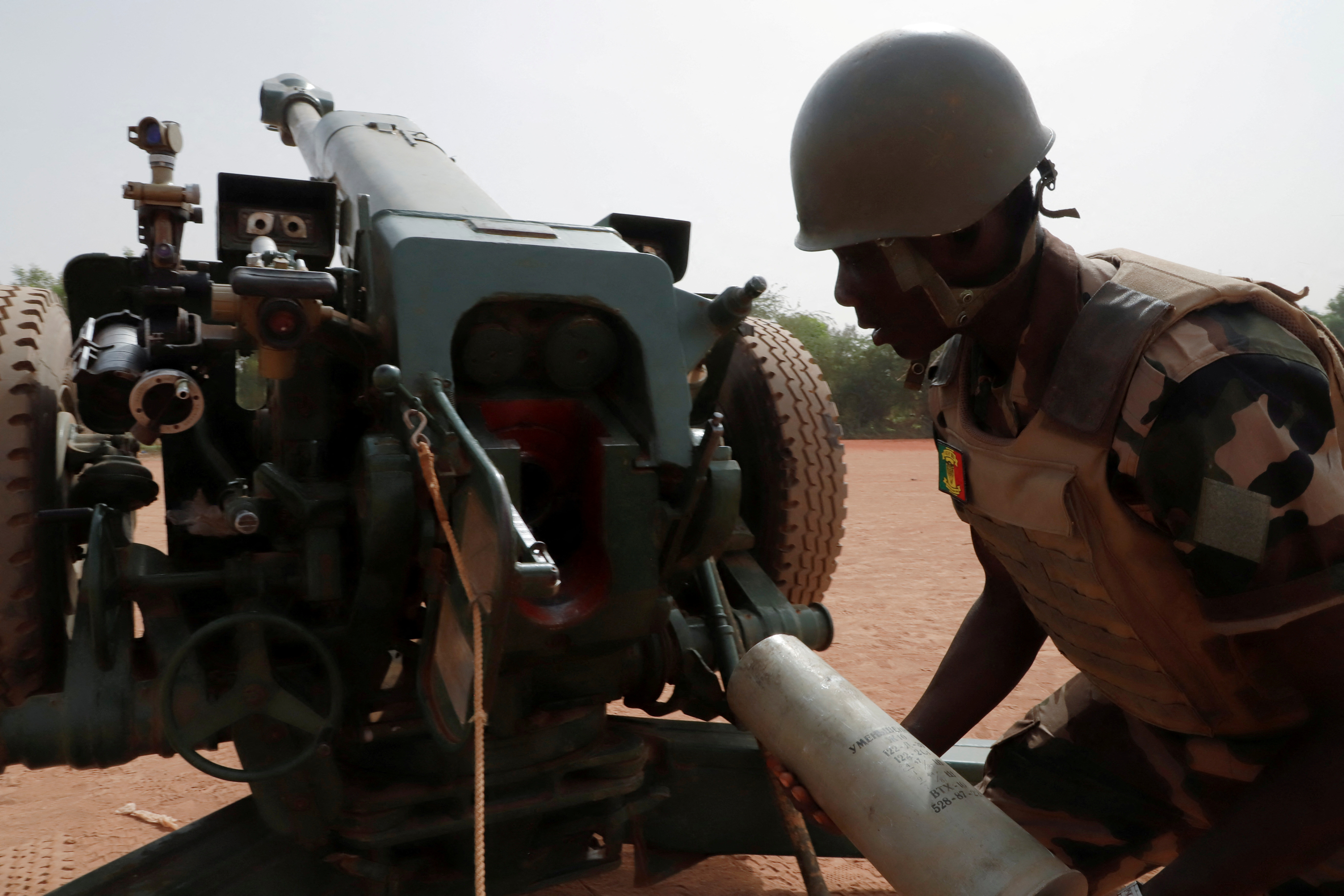 A Malian soldier of the 614th Artillery Battery is pictured during a training session on a D-30 howitzer with the European Union Training Mission (EUTM), to fight jihadists, in the camp of Sevare, Mopti region, in Mali March 23, 2021