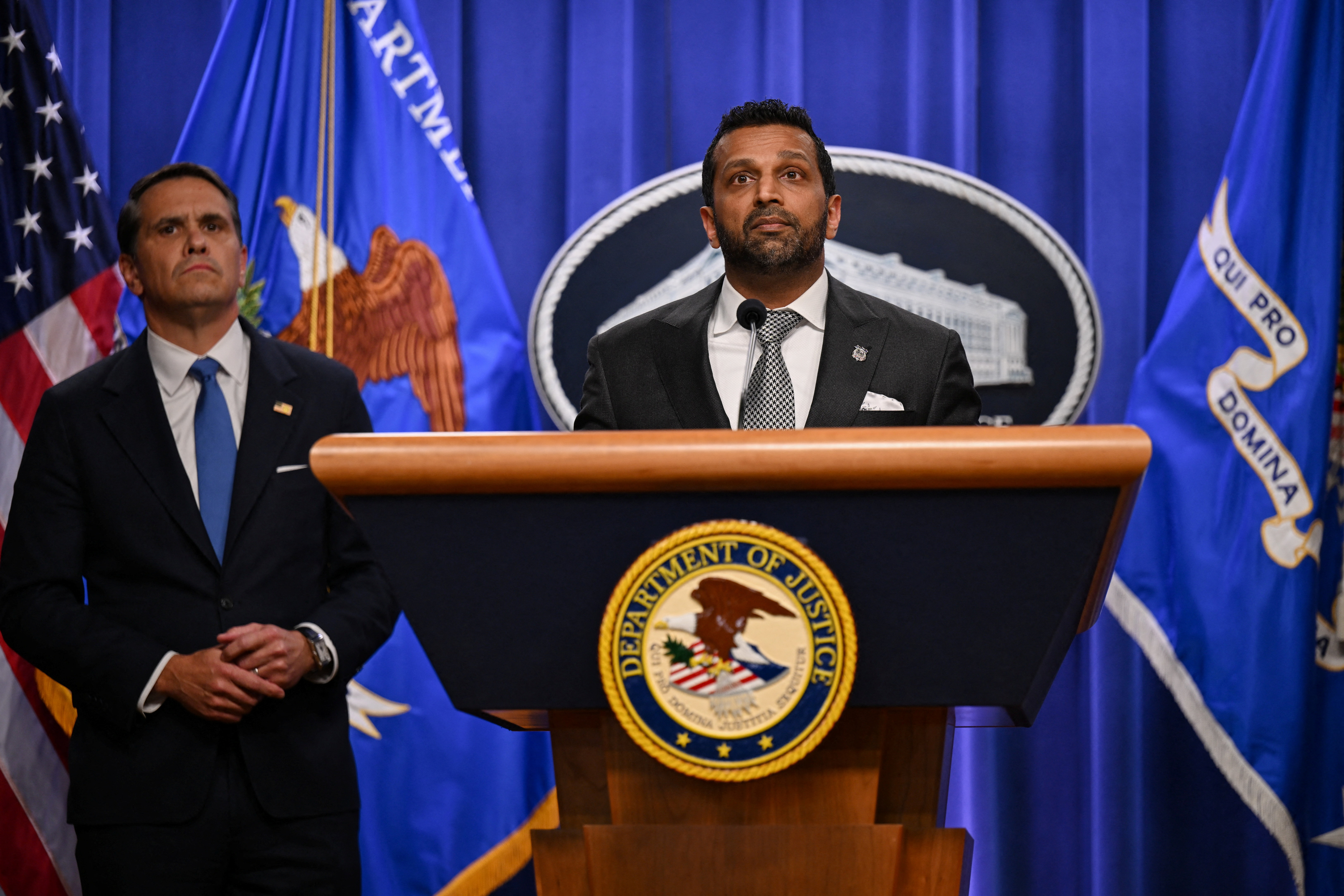 Federal Bureau of Investigation (FBI) Director Kash Patel speaks as Acting U.S. Attorney General Todd Blanche stands by his side during a press conference at the Department of Justice in Washington, D.C., U.S., April 21, 2026.
