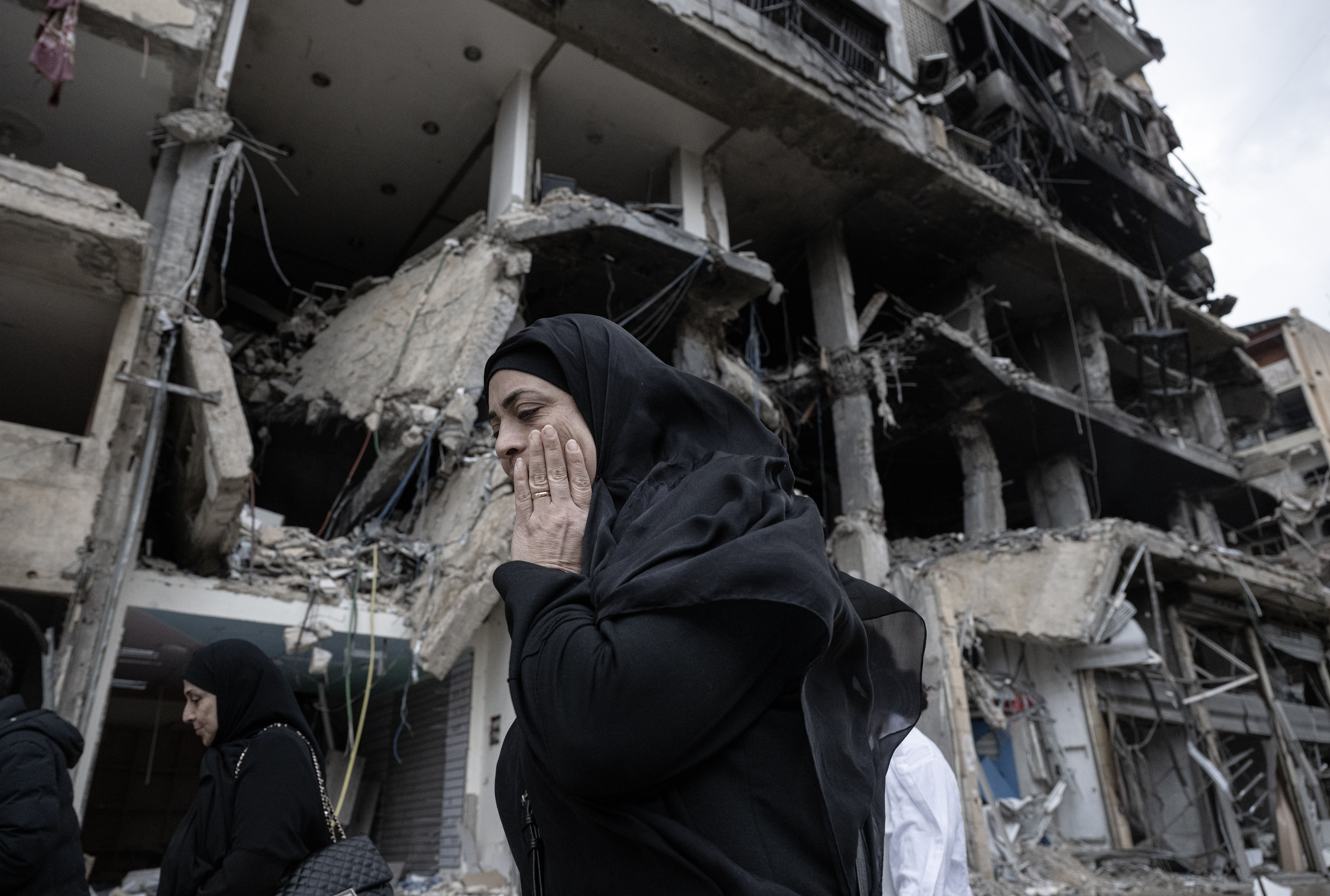 BEIRUT, LEBANON - APRIL 20: Lebanese people walk among the rubble of destroyed buildings as they begin returning their homes following the implementation of the ceasefire between Israel and Lebanon, in Beirut, Lebanon on April 20, 2026. In the Dahieh district in southern Beirut, daily life has started to regain momentum while heavy damage was reported to infrastructure and residential areas due to Israeli attacks. ( Elif Öztürk - Anadolu Agency )