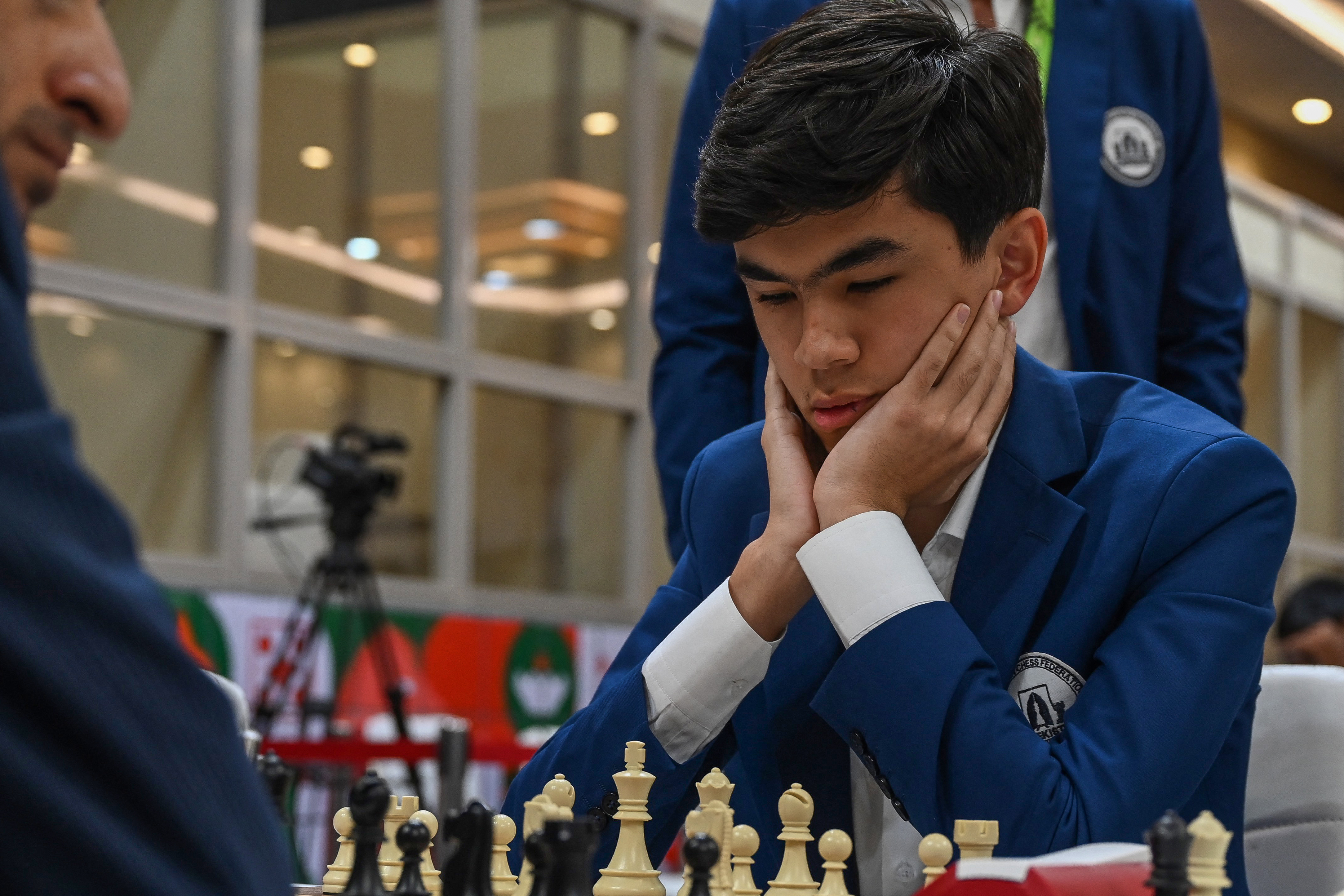 Uzbekistan's Javokhir Sindarov (R) during a game.