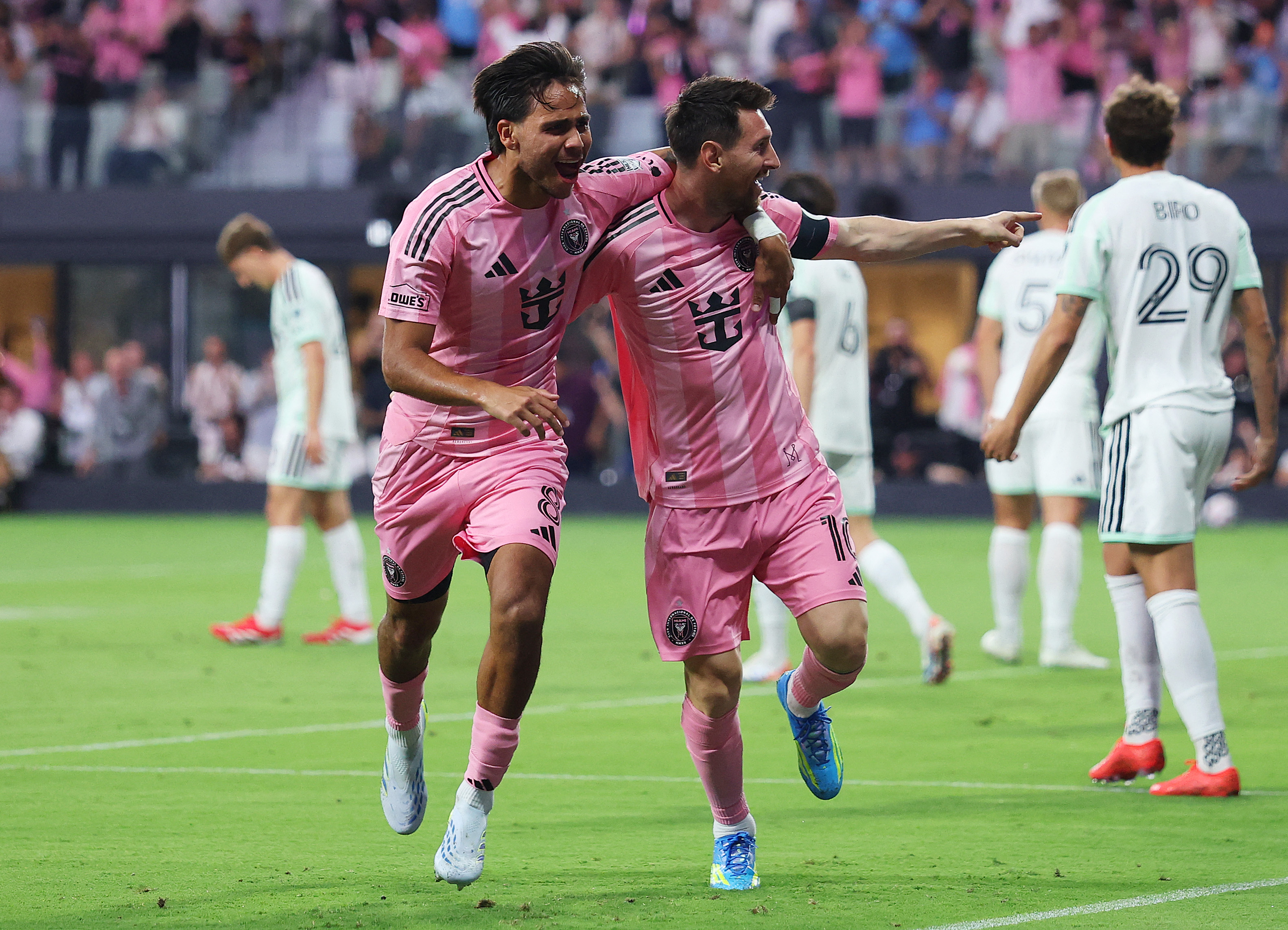 MIAMI, FLORIDA - APRIL 04: Lionel Messi #10 of Inter Miami CF celebrates with teammate Telasco Segovia #8 after scoring the team's first goal during the MLS match between Inter Miami CF and Austin FC at Nu Stadium on April 04, 2026 in Miami, Florida. Tomas Diniz Santos/Getty Images/AFP (Photo by Tomas Diniz Santos / GETTY IMAGES NORTH AMERICA / Getty Images via AFP)