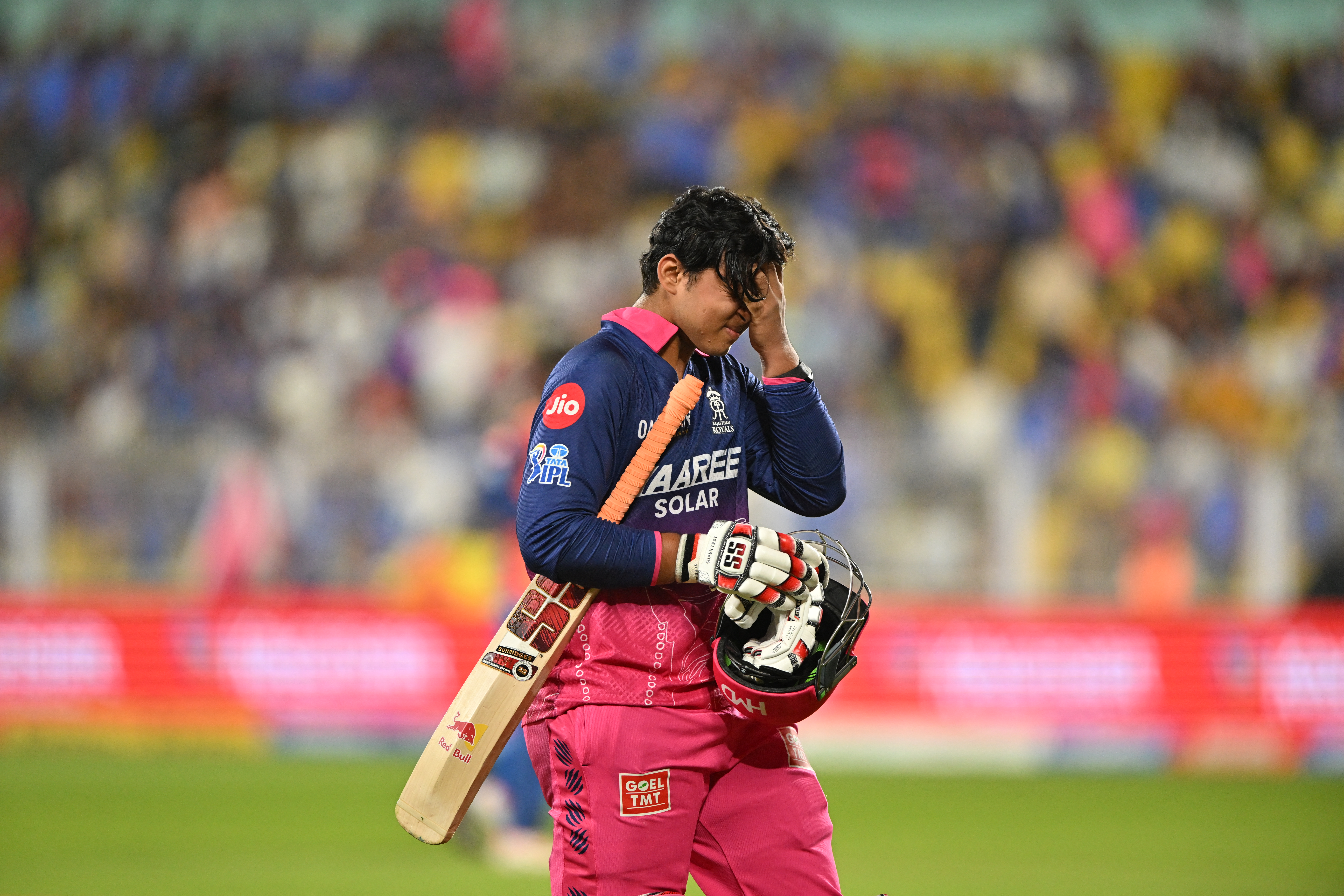 Rajasthan Royals' Indian cricket player Vaibhav Suryavanshi walks back to the pavilion after his dismissal during the 2026 Indian Premier League (IPL) T20 match between Rajasthan Royals and Mumbai Indians at the Barsapara Cricket Stadium in Guwahati on April 7, 2026. (Photo by BIJU BORO / AFP) / -- IMAGE RESTRICTED TO EDITORIAL USE - STRICTLY NO COMMERCIAL USE --