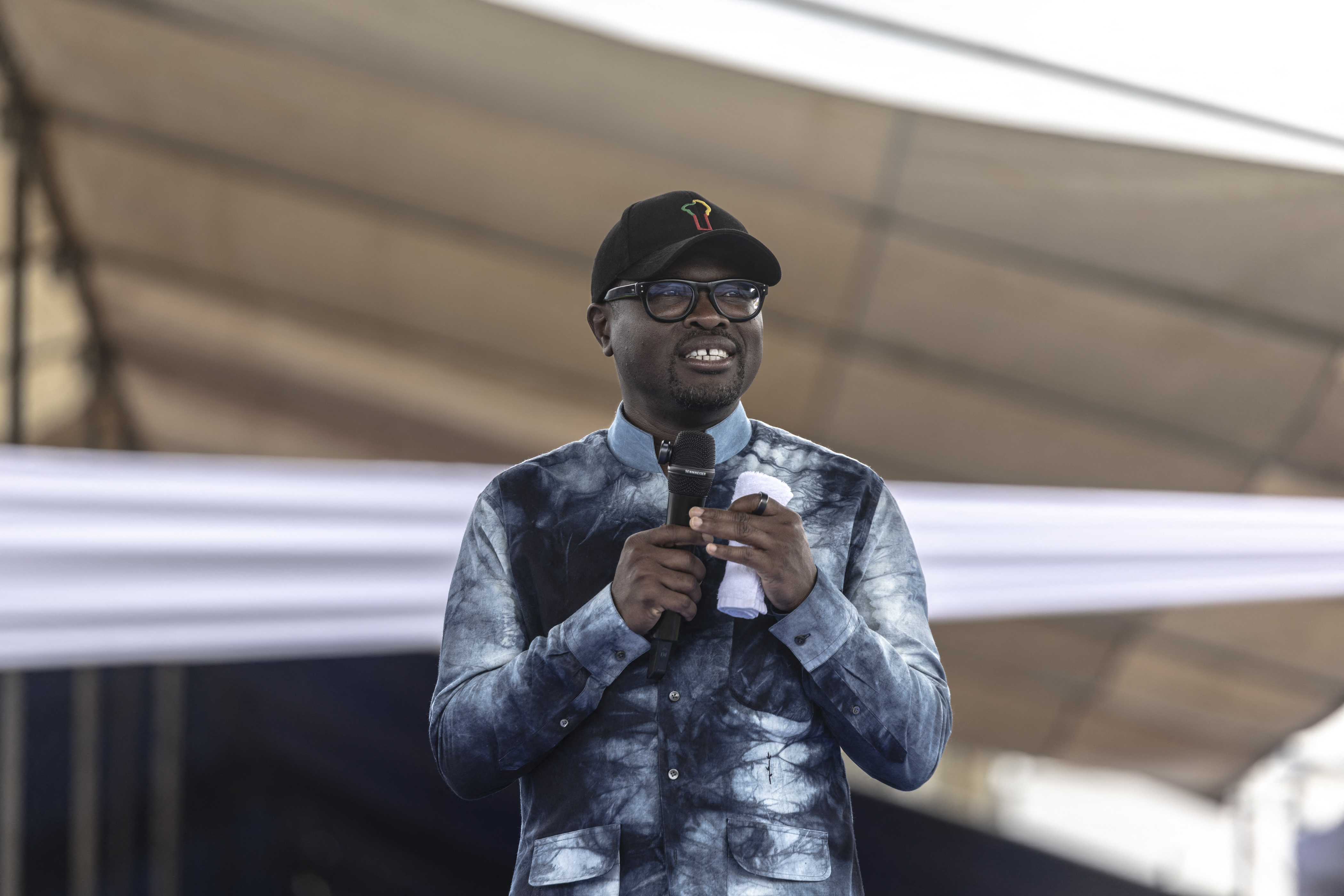 Presidential candidate Romuald Wadagni gives a speech during a campaign rally in Cotonou on April 10, 2026, ahead of Benin's presidential election scheduled for April 12, 2026. (Photo by OLYMPIA DE MAISMONT / AFP)