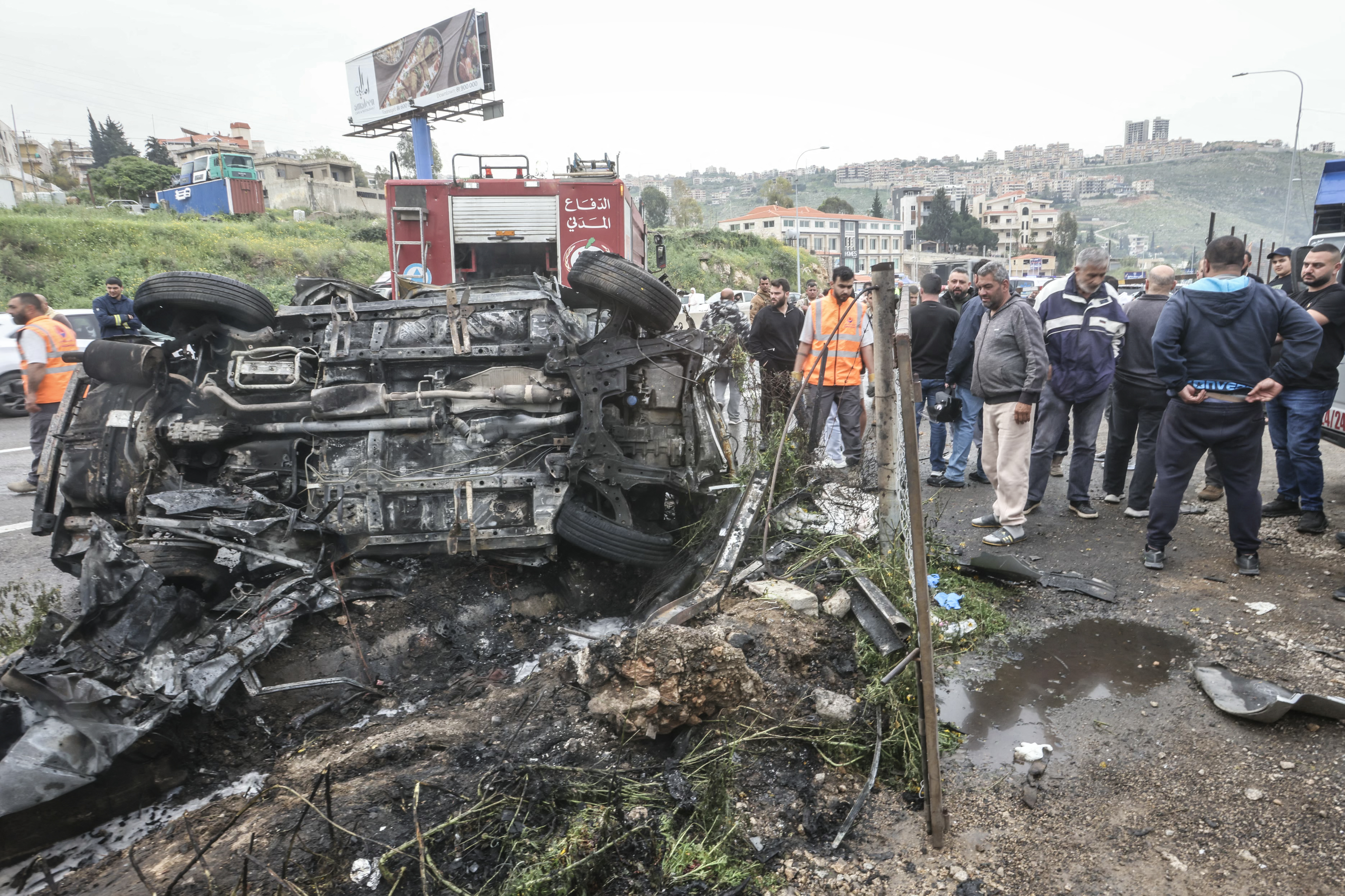 Aftermath of an Israeli airstrike that targeted a vehicle the Lebanese town of Jiyeh, south of Beirut