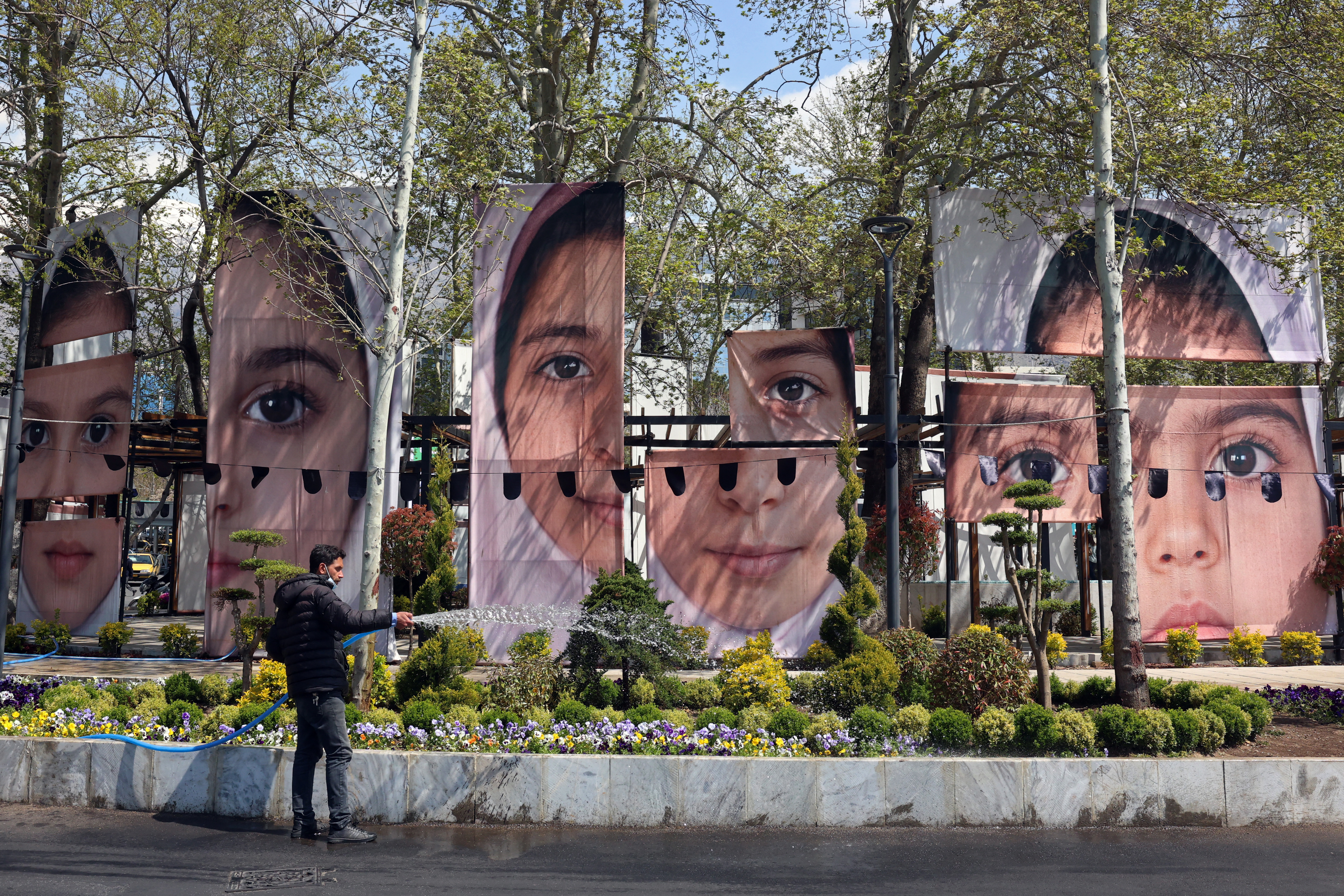Tehran streets filled with portraits of children killed in US-Israeli strike on Minab.