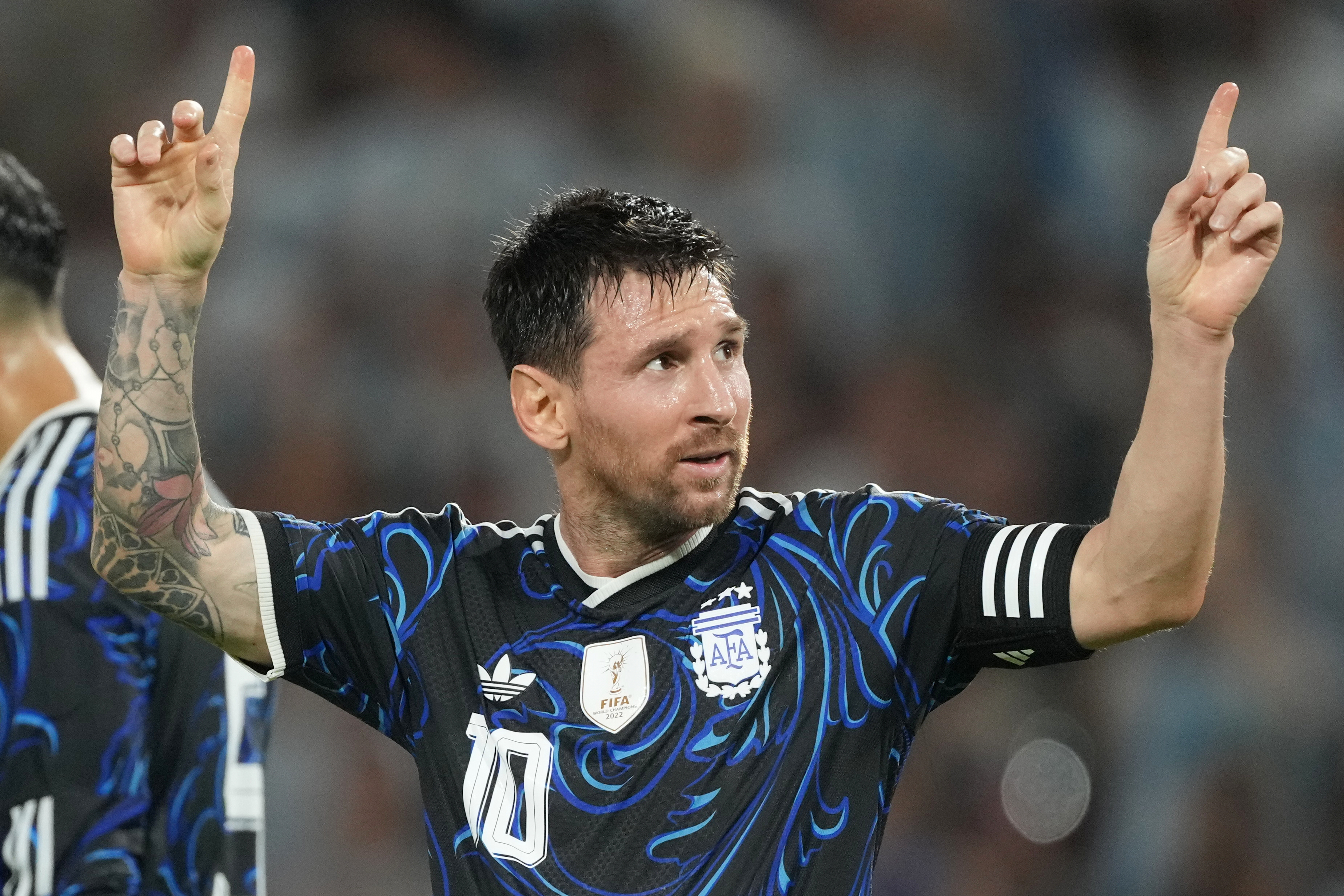 Argentina's Lionel Messi celebrates scoring his side's second goal against Zambia during a friendly soccer match