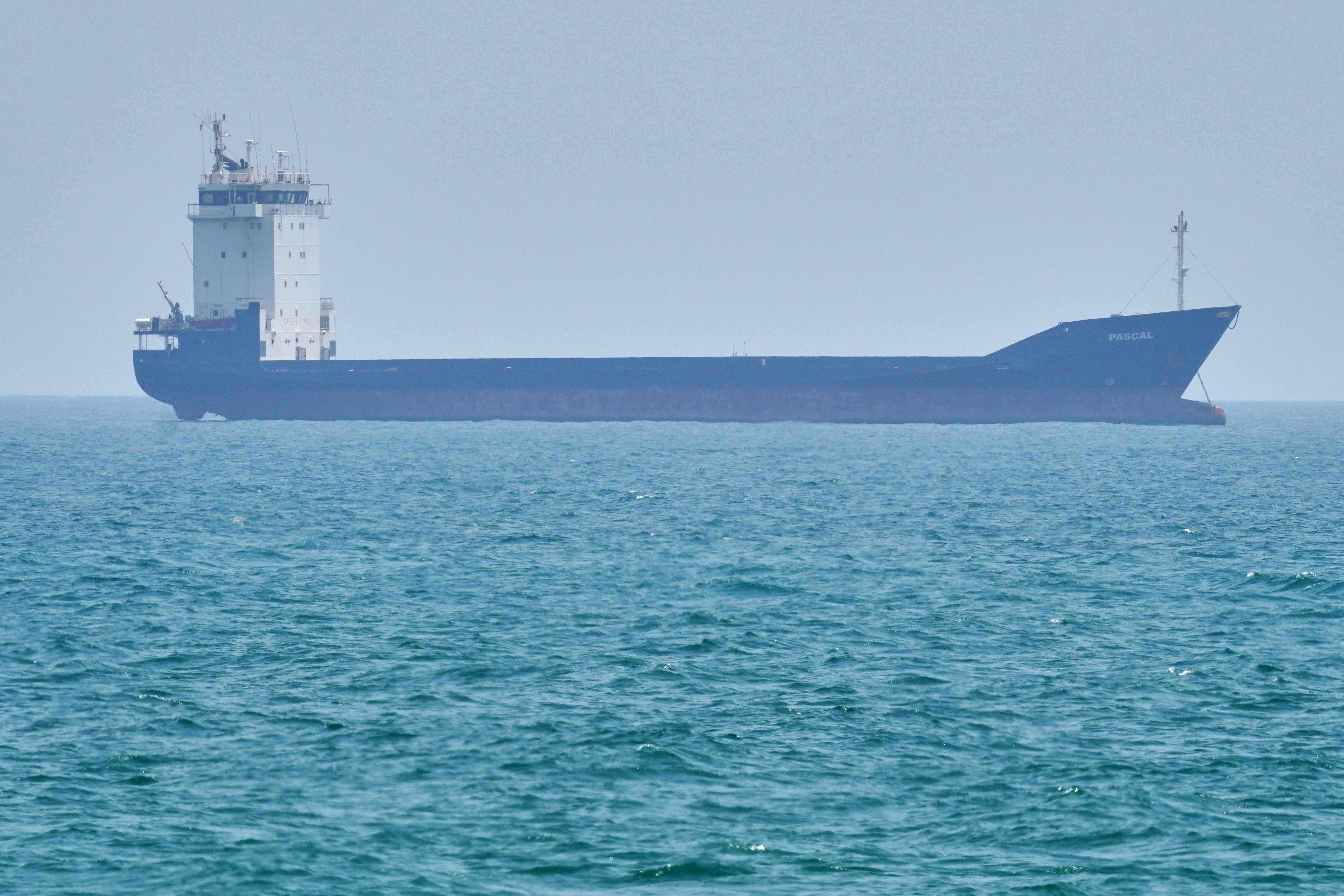A tanker sits anchored in the Strait of Hormuz off the coast of Qeshm Island, Iran, Saturday, April 18, 2026. (AP Photo/Asghar Besharati)