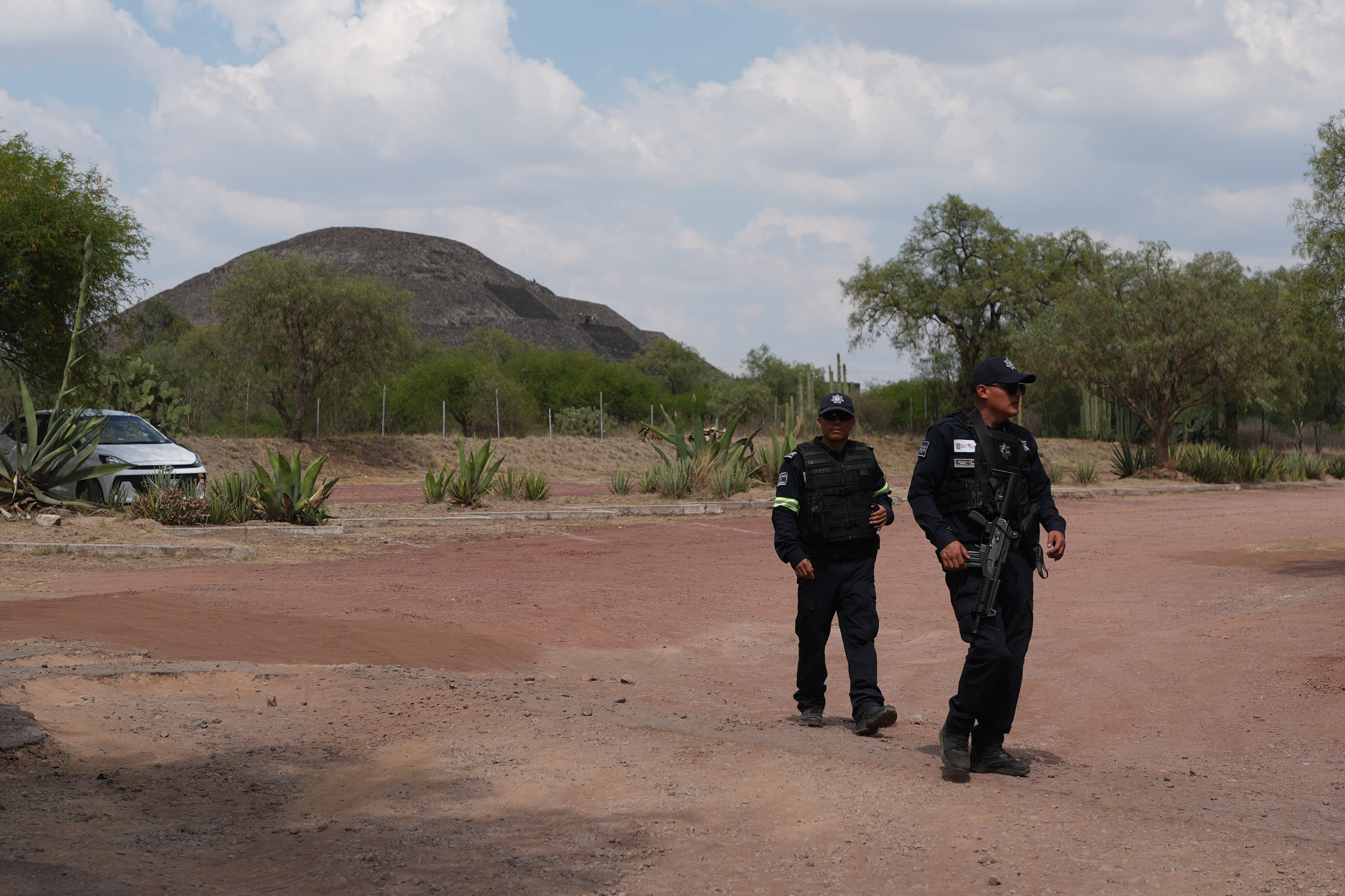 Police patrol the pyramids after an attacker opened fire in Teotihuacan, Mexico