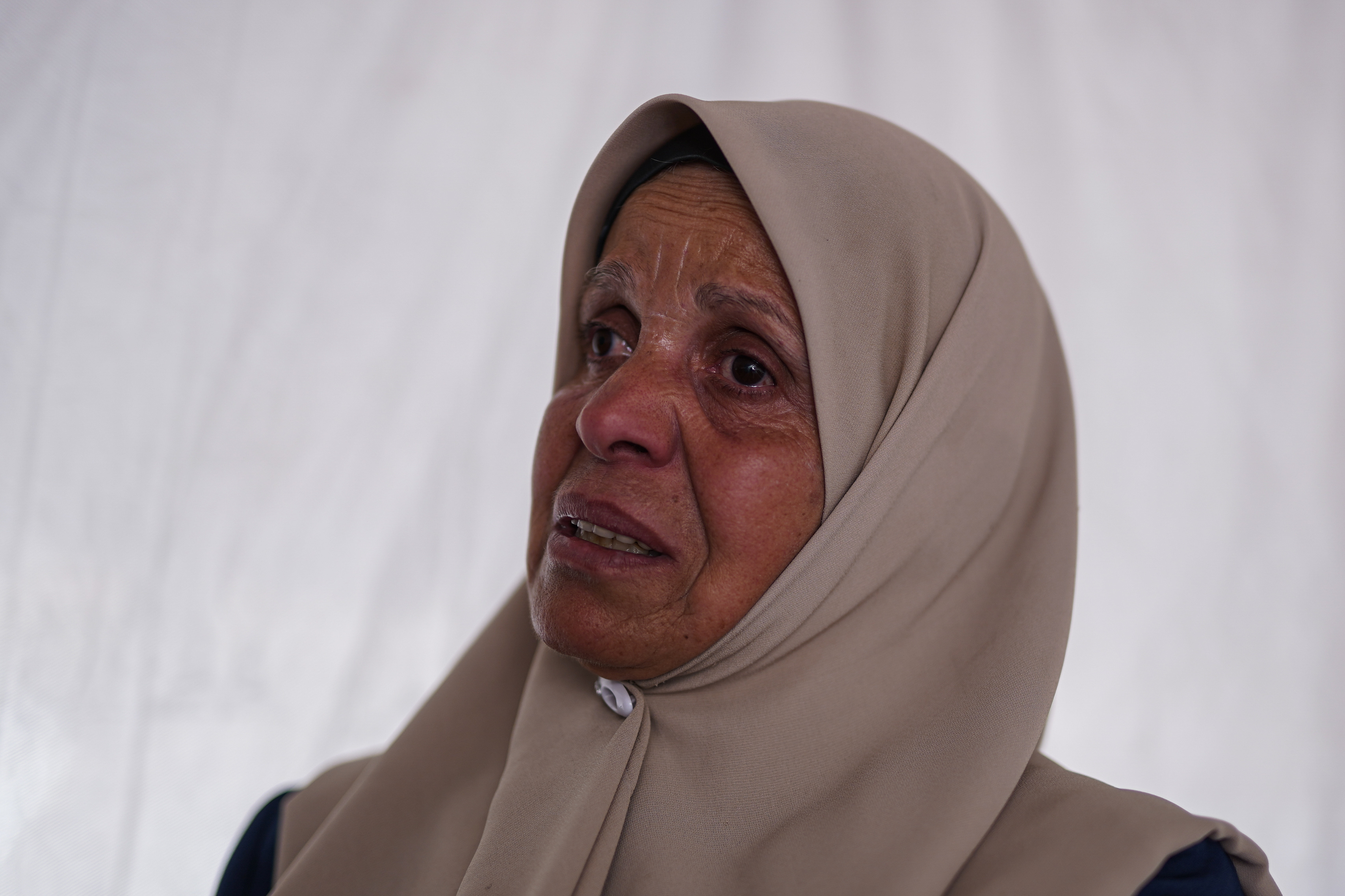 Ina’am feels deep anxiety about the lives of her imprisoned sons amid escalating conditions in the prisons and the approval of a law enabling the execution of prisoners in Israeli jails [Omar Ashtawy/ Al Jazeera]