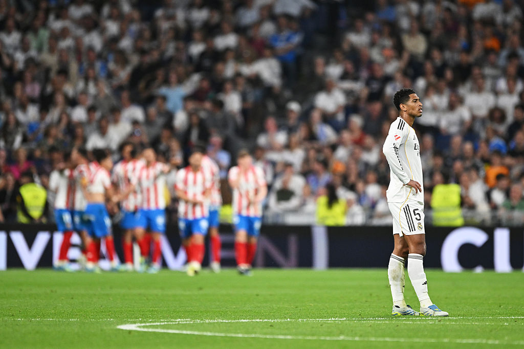Jude Bellingham of Real Madrid looks dejected after Thomas Lemar of Girona FC (not pictured) scores his team's first goal