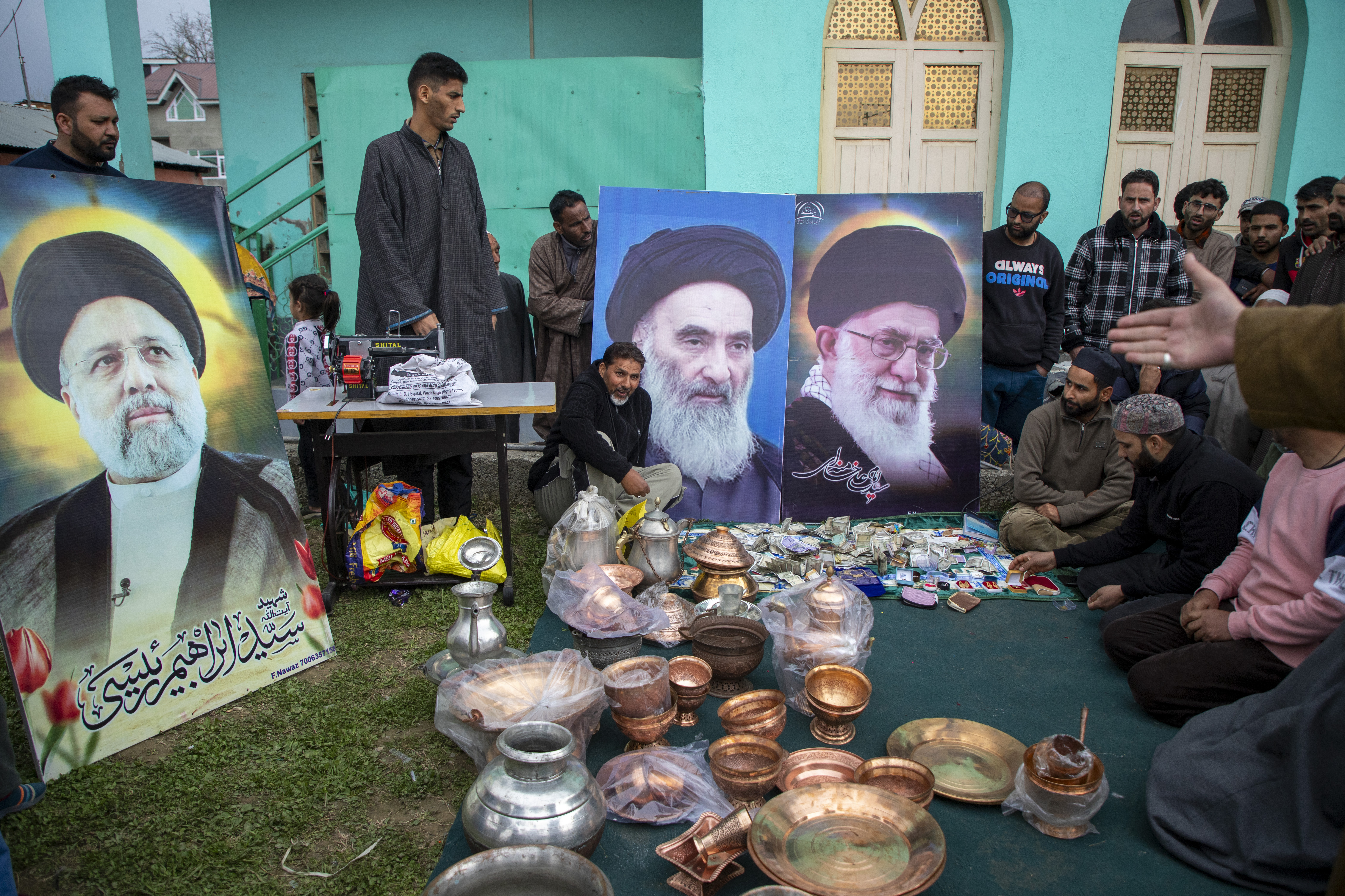 Kashmiris in a collection drive, with utensils and cash donated.