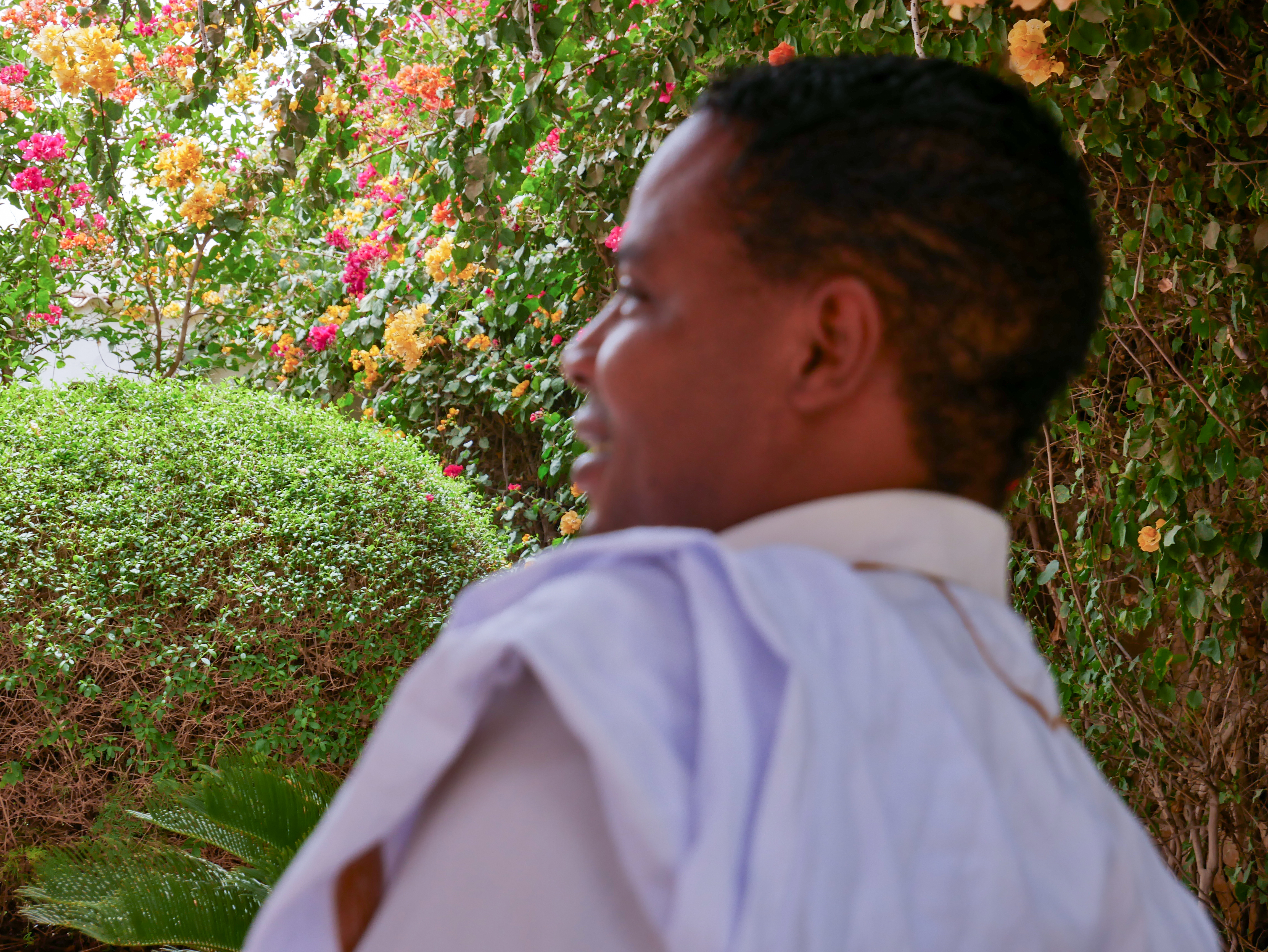 Mohamed, who doesn't want to be fully identified, says he was arrested and paid a bribe despite being processed as an asylum seeker [Shola Lawal/Al Jazeera]