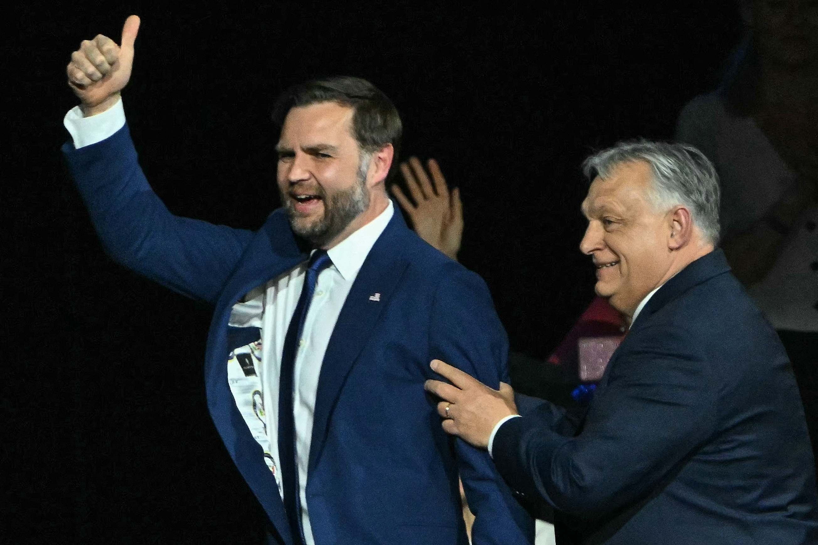 US Vice President JD Vance (L) and Hungarian Prime Minister Viktor Orban appear on stage together during a "Day of Friendship" event at MTK Sportpark in Budapest, Hungary on April 7, 2026.