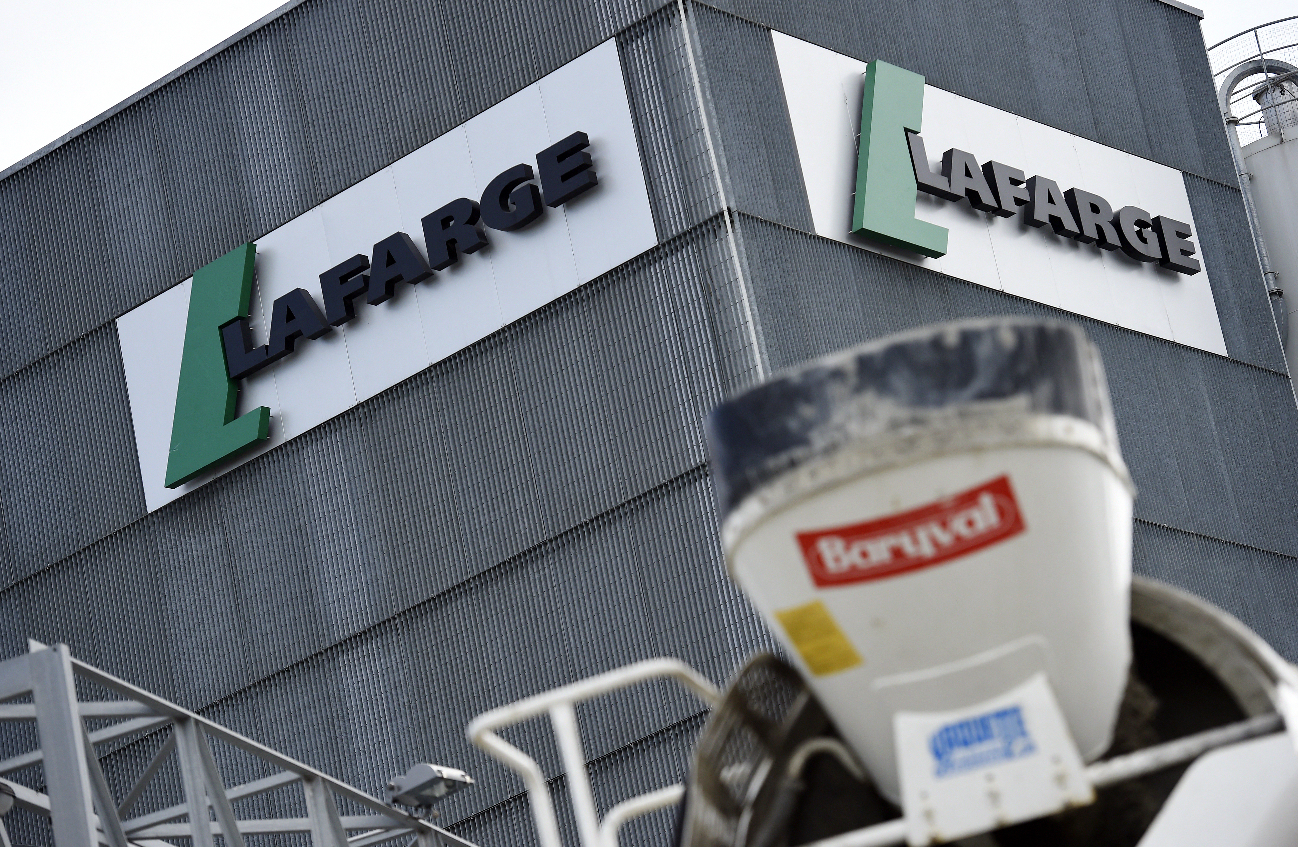A picture shows the logo on a plant of French cement company Lafarge on April 7, 2014 in Paris.