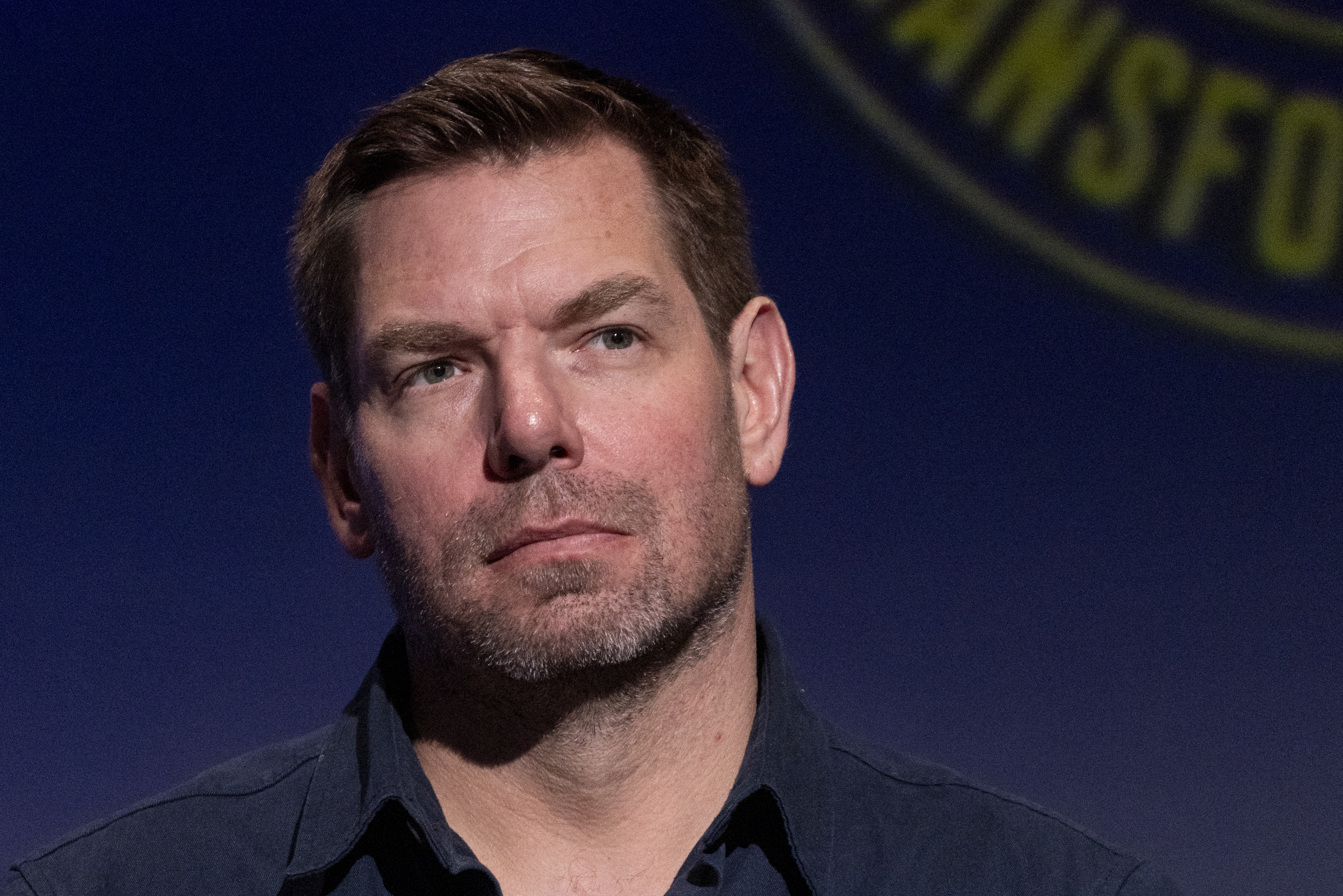 (FILES) US Representative Eric Swalwell, Democrat of California, looks on during the SEIU-United Service Workers West's Gubernatorial Candidate Worker Forum at Meruelo Studios in Los Angeles, California, on January 10, 2026.