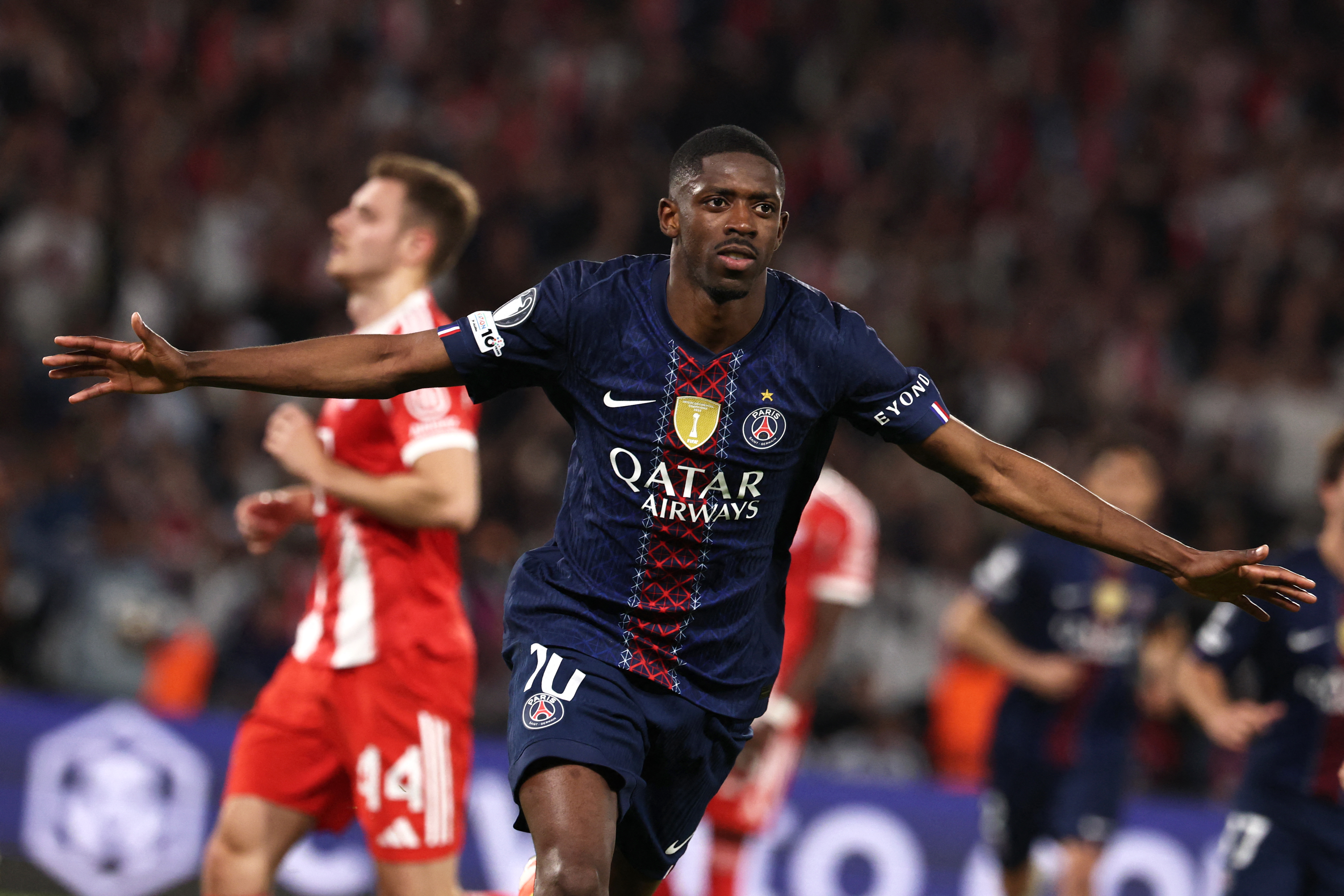 A football player on the pitch running