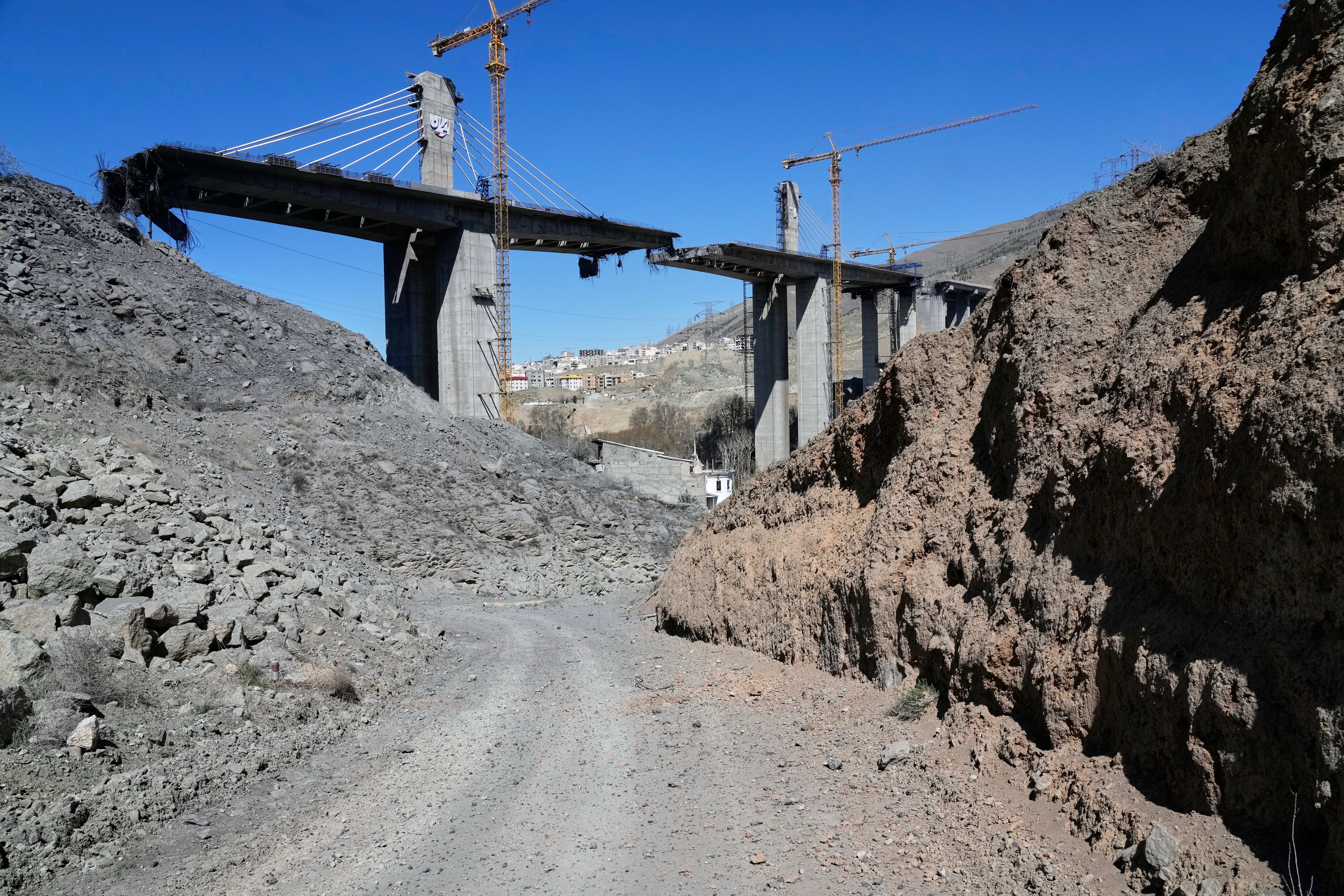 A newly constructed bridge struck by U.S. airstrikes Thursday is seen in Karaj, west of Tehran, Iran, Friday, April 3, 2026. (AP Photo/Vahid Salemi)