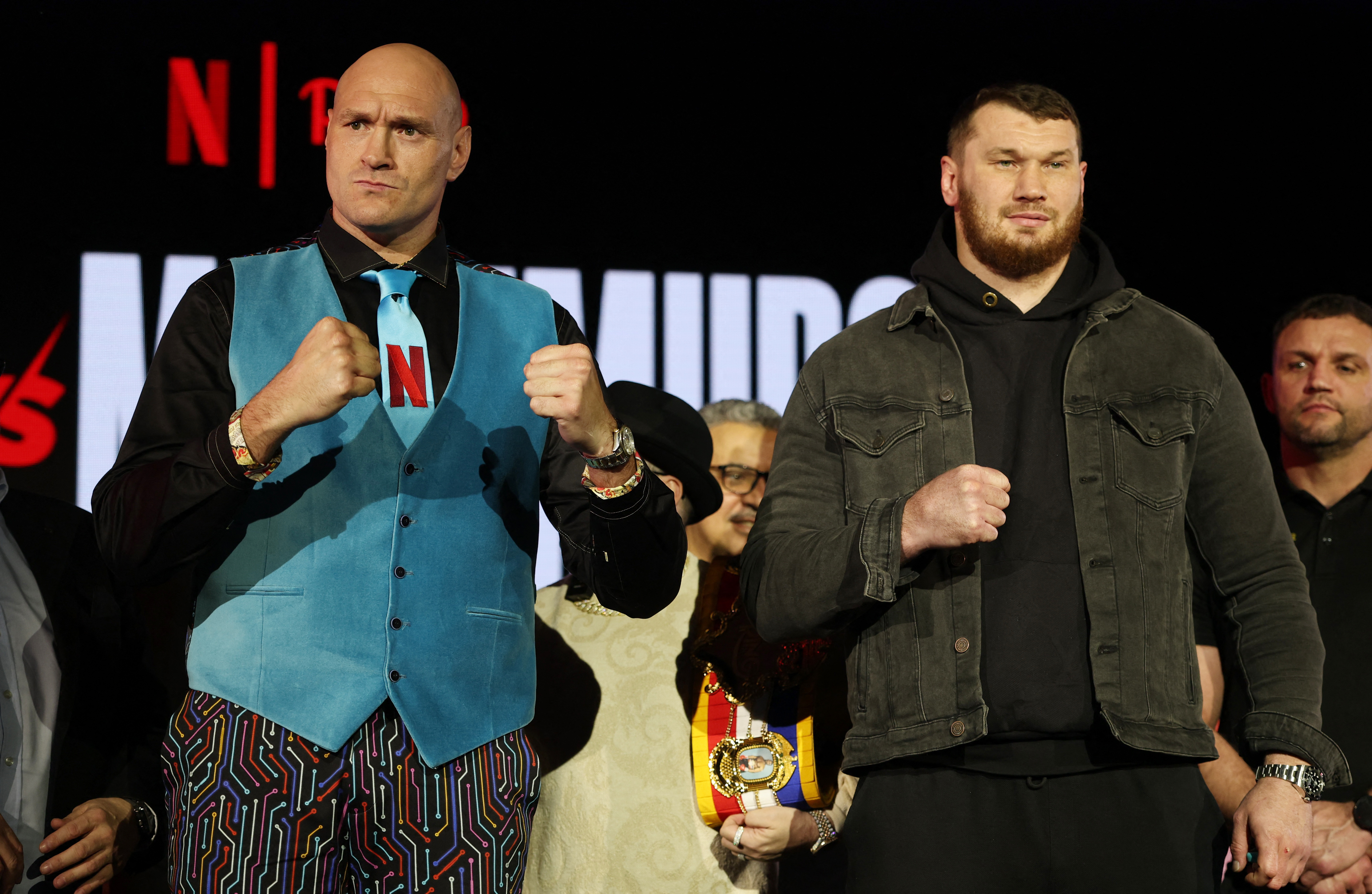 Tyson Fury and Arslanbek Makhmudov at a news conference.